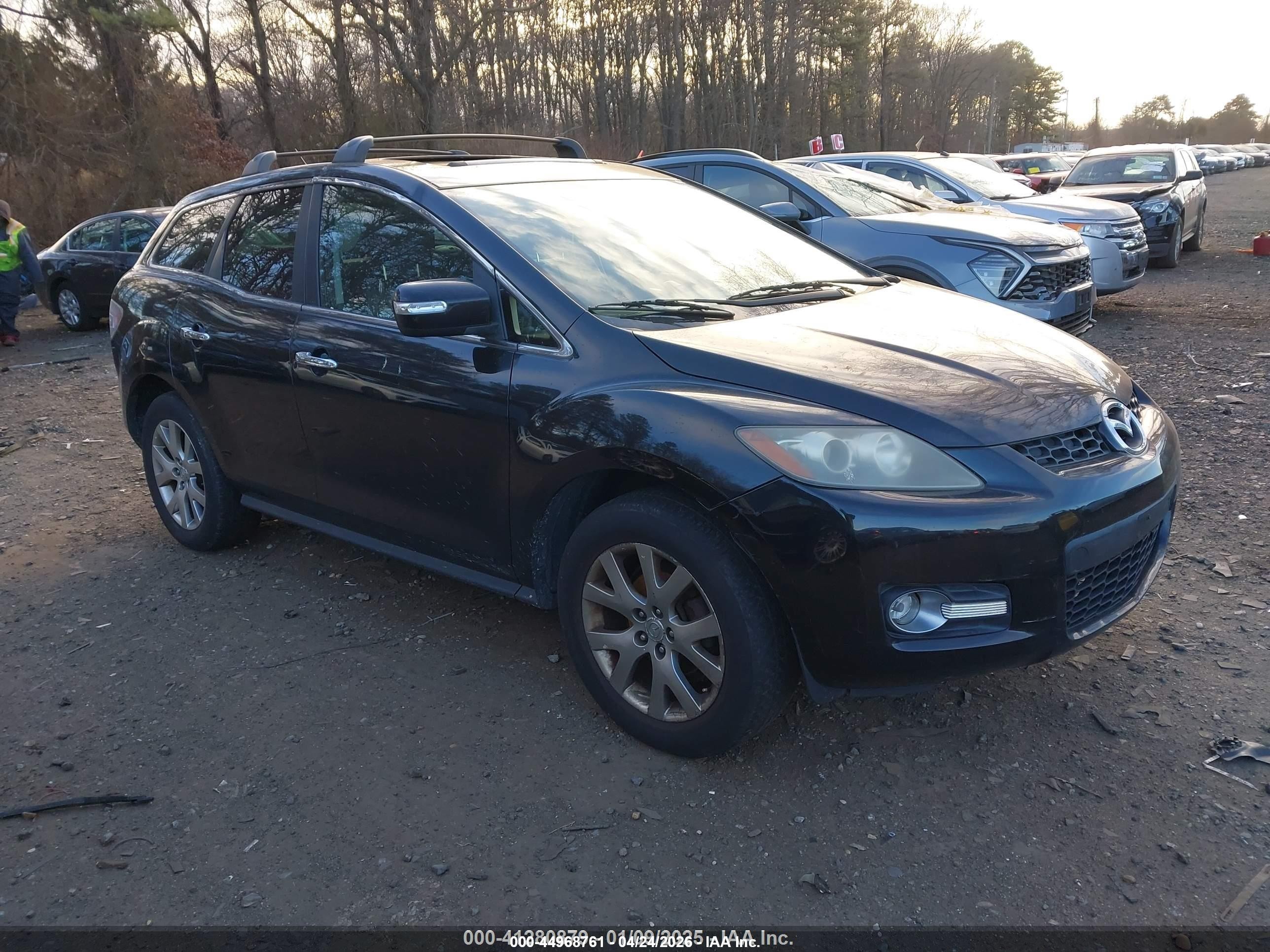 2009 Mazda CX-7 Touring, VIN JM3ER29L390224887 — Theft recovery