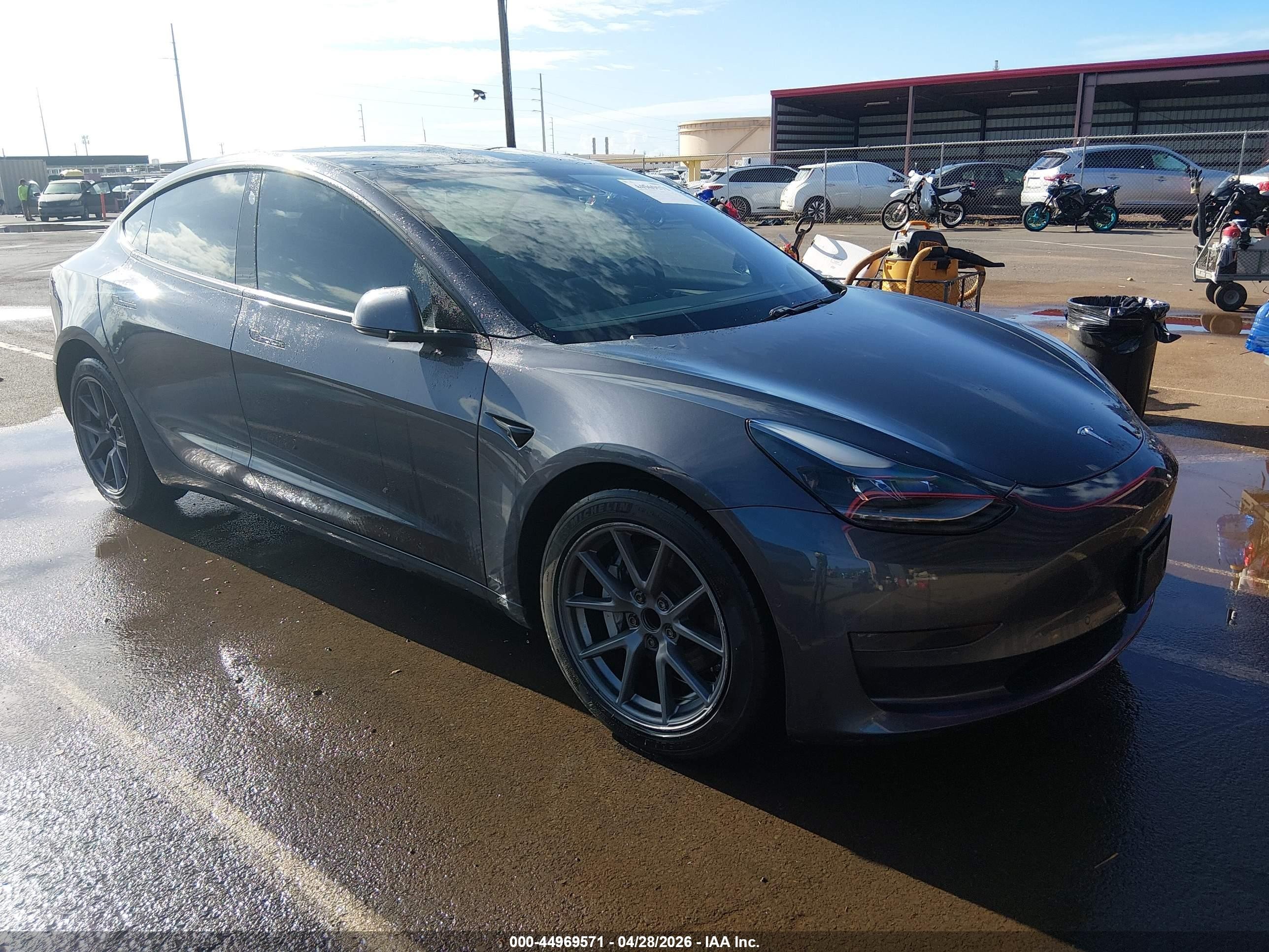2021 Tesla Model 3 Standard Range Plus, VIN 5YJ3E1EAXMF982066 — Not stated
