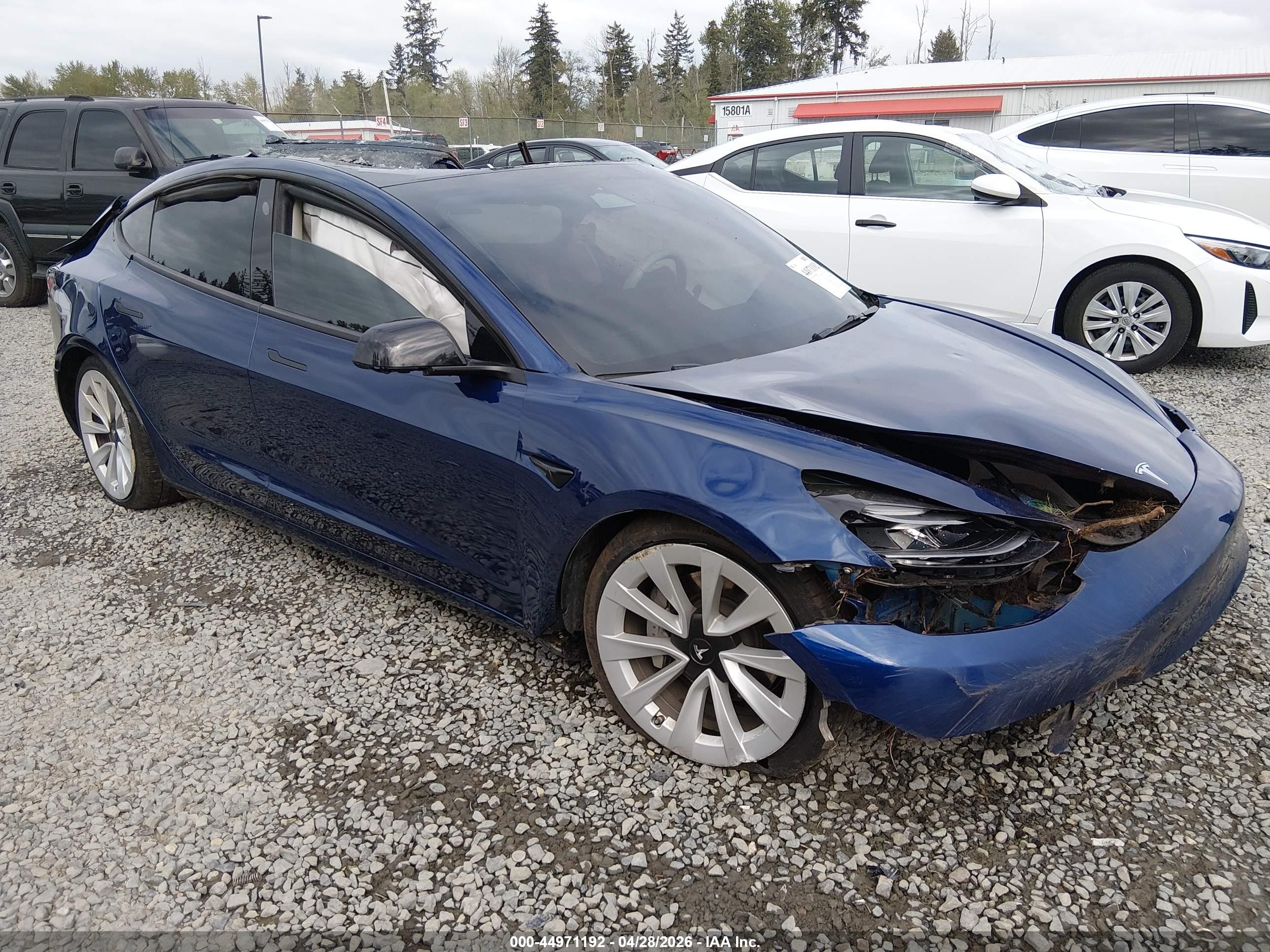 2023 Tesla Model 3, VIN 5YJ3E1EA3PF448475 — Rollover