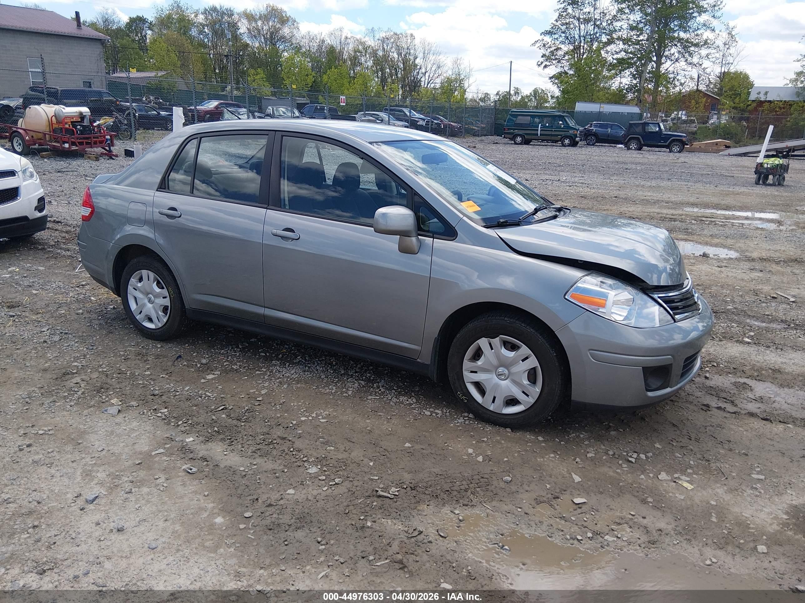 2011 Nissan Versa S, VIN 3N1BC1AP7BL445099 — Side