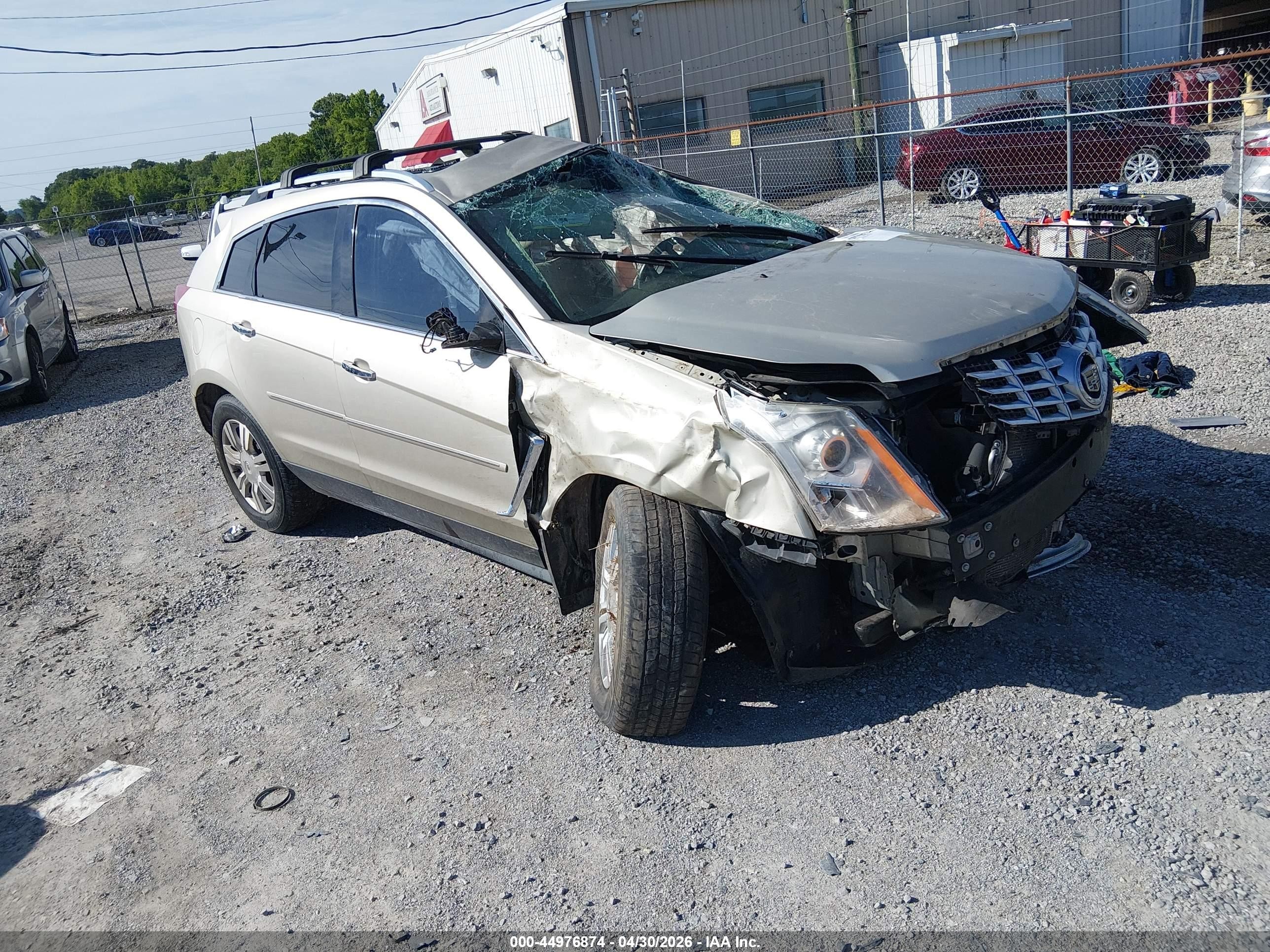 2015 Cadillac SRX Luxury Collection, VIN 3GYFNBE33FS520974 — Опрокидывание