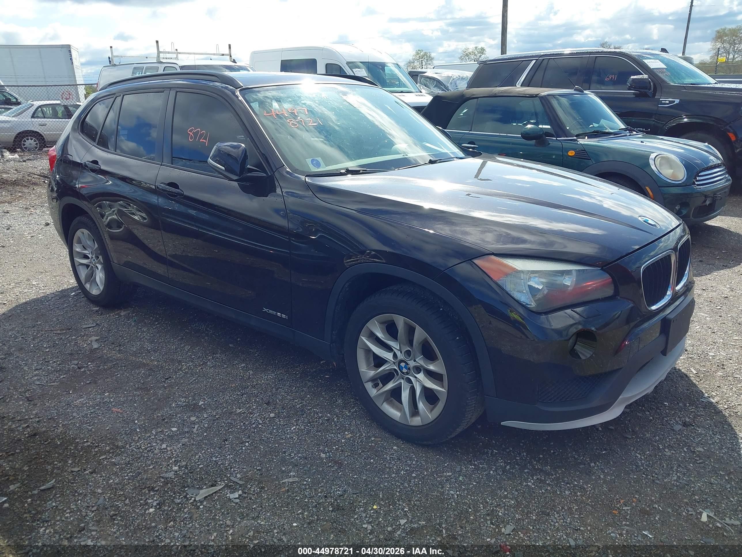 2015 BMW X1 xDrive28i, VIN WBAVL1C57FVY34561 — Normal wear