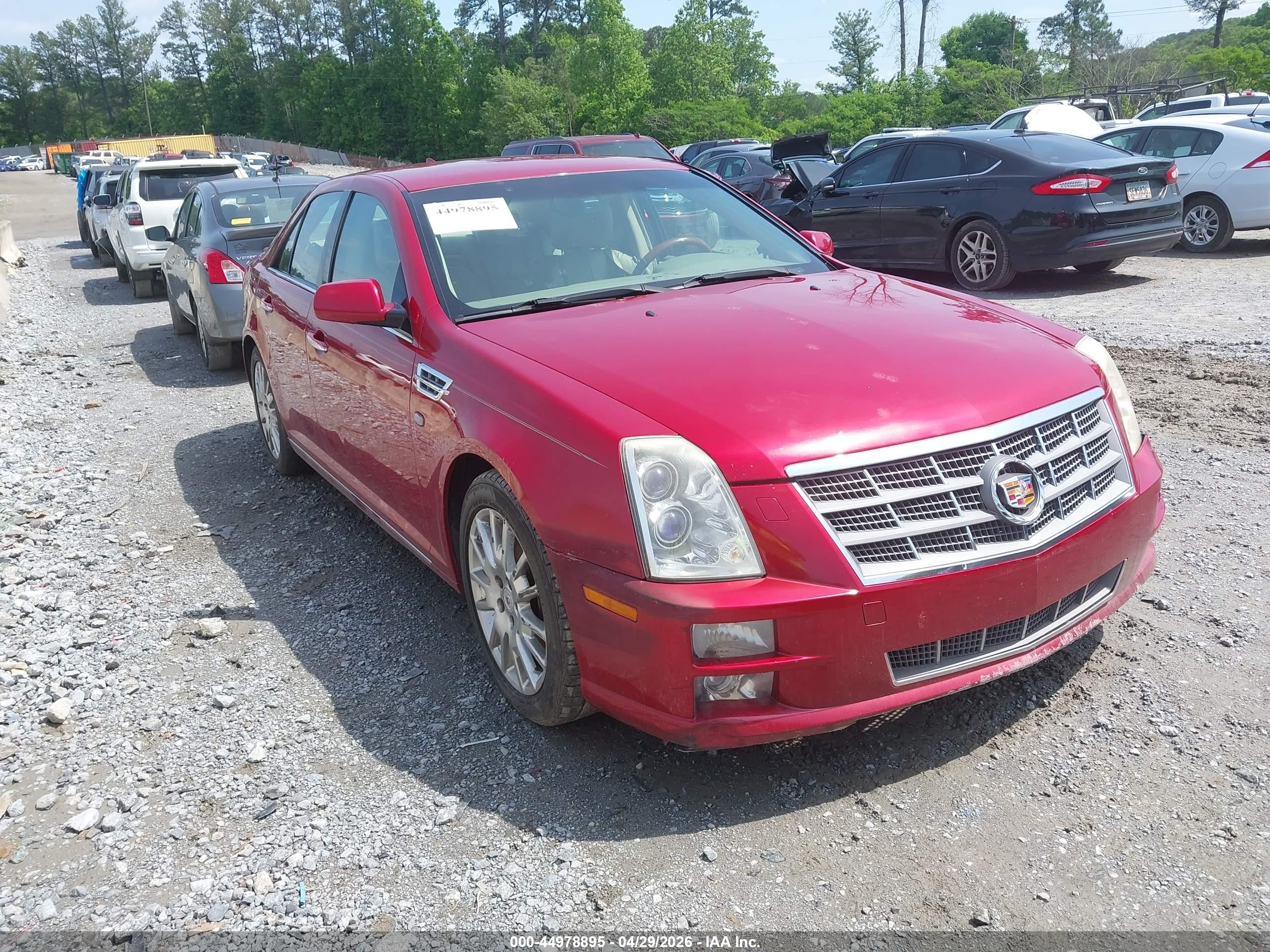 2011 Cadillac STS RWD, VIN 1G6DX6ED8B0120811 — Бок