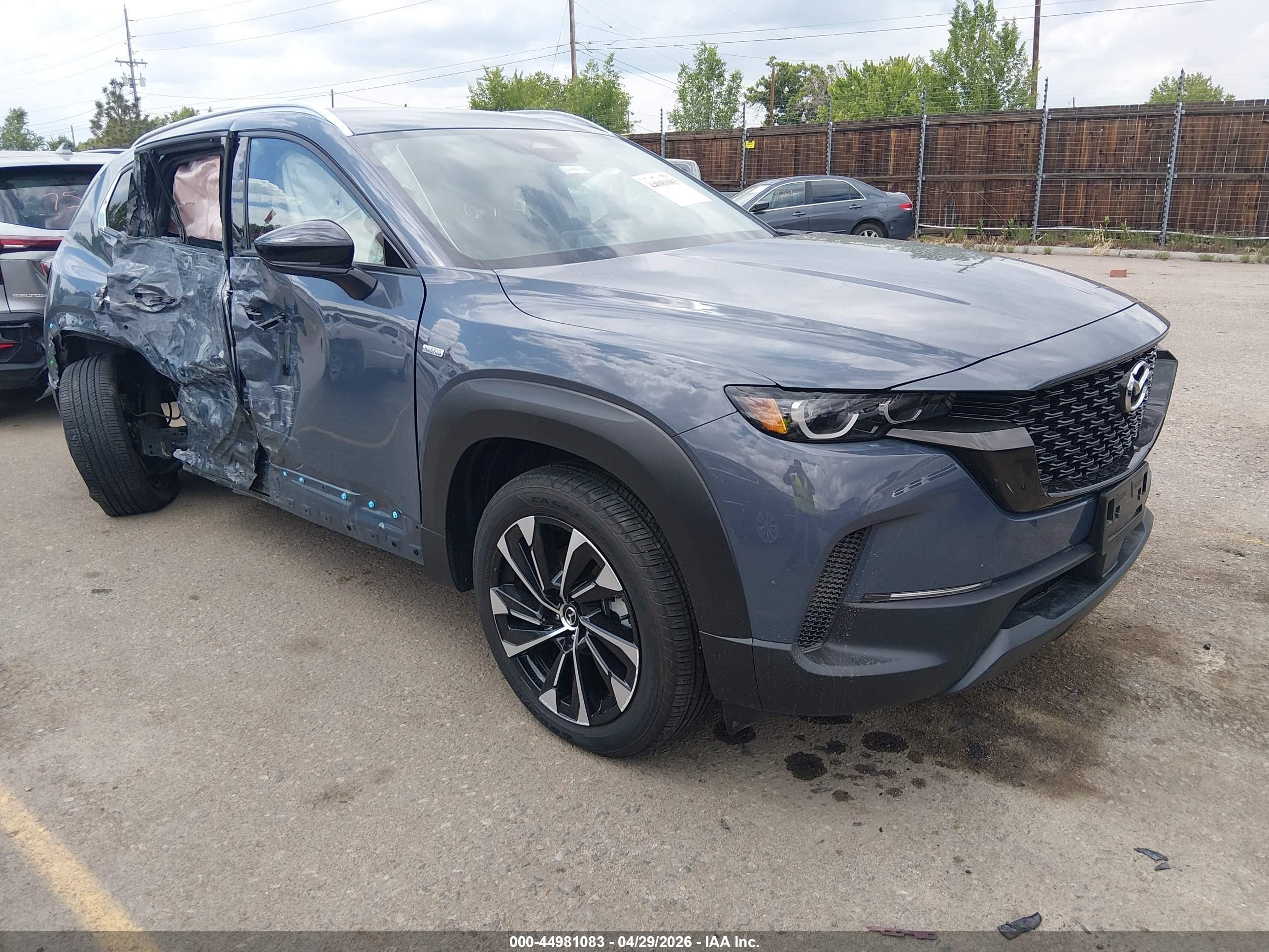 2025 Mazda CX-50 Hybrid Premium Plus Package, VIN 7MMVAAEW0SN116391 — Side