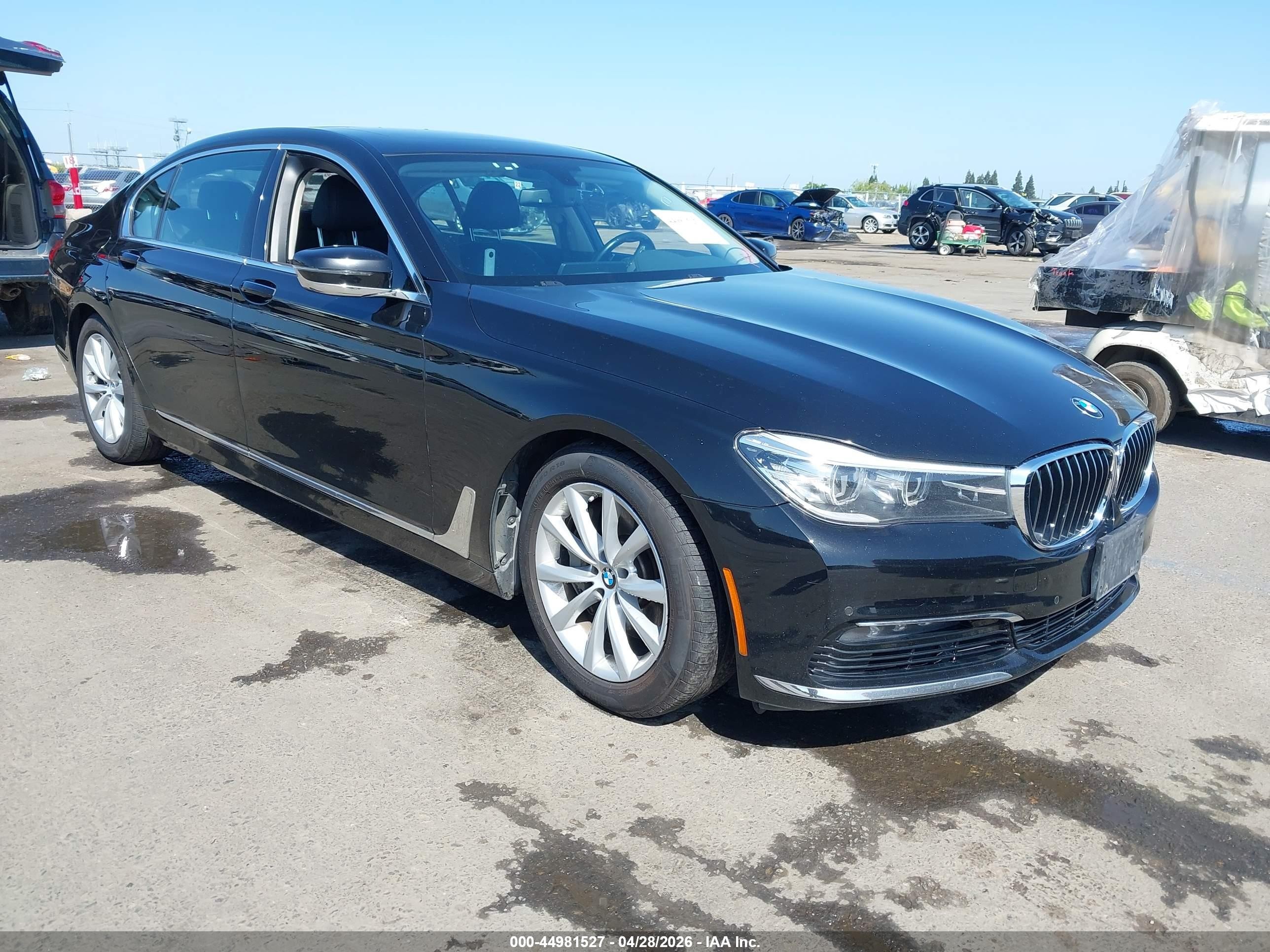 2016 BMW 7 Series 740i, VIN WBA7E2C58GG547616 — Rear end