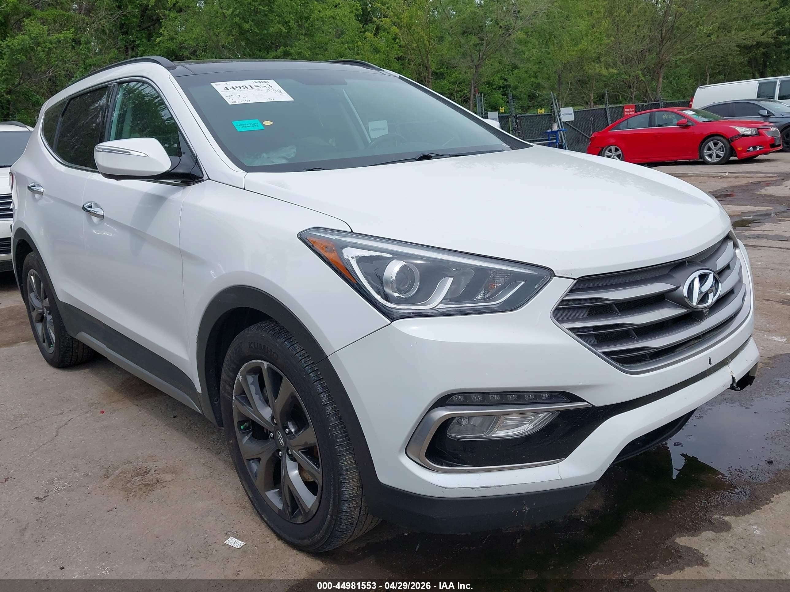 2017 Hyundai Santa Fe Ultimate, VIN 5NMZWDLA0HH047560 — Rear end