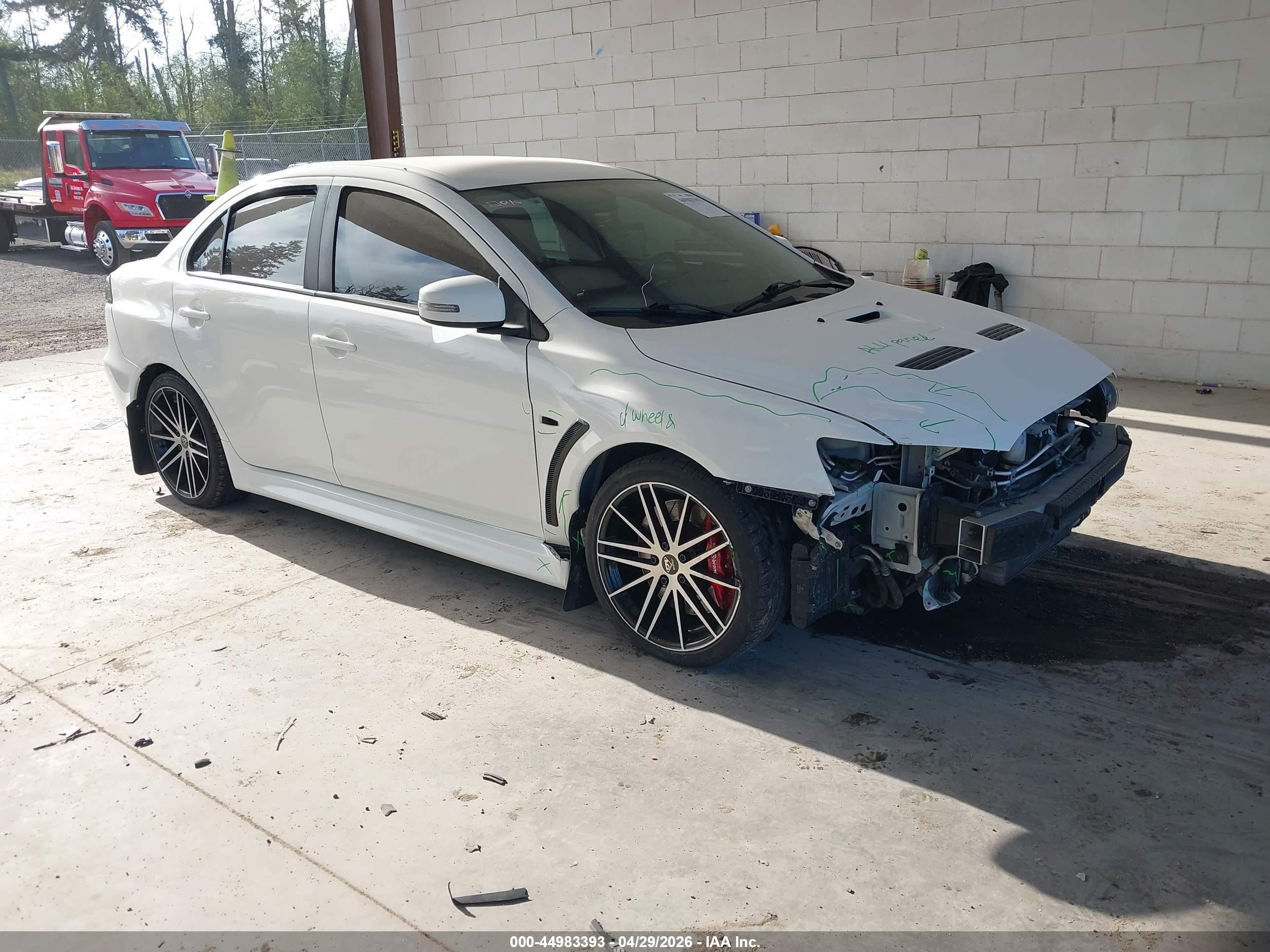 2015 Mitsubishi Lancer Evolution GSR, VIN JA32W8FV4FU007946 — Front end