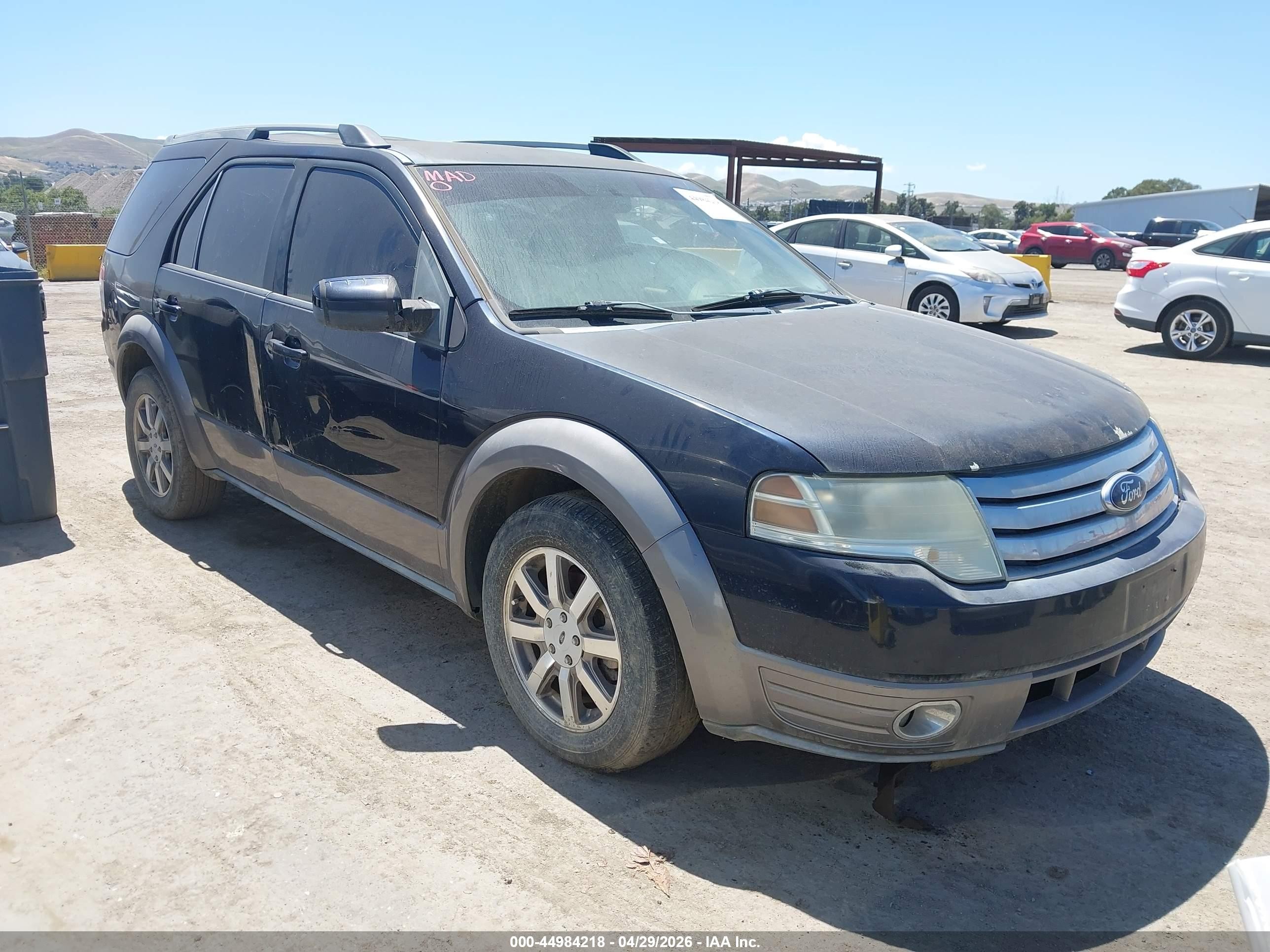 2008 Ford Taurus X SEL, VIN 1FMDK02W78GA29488 — Normal wear