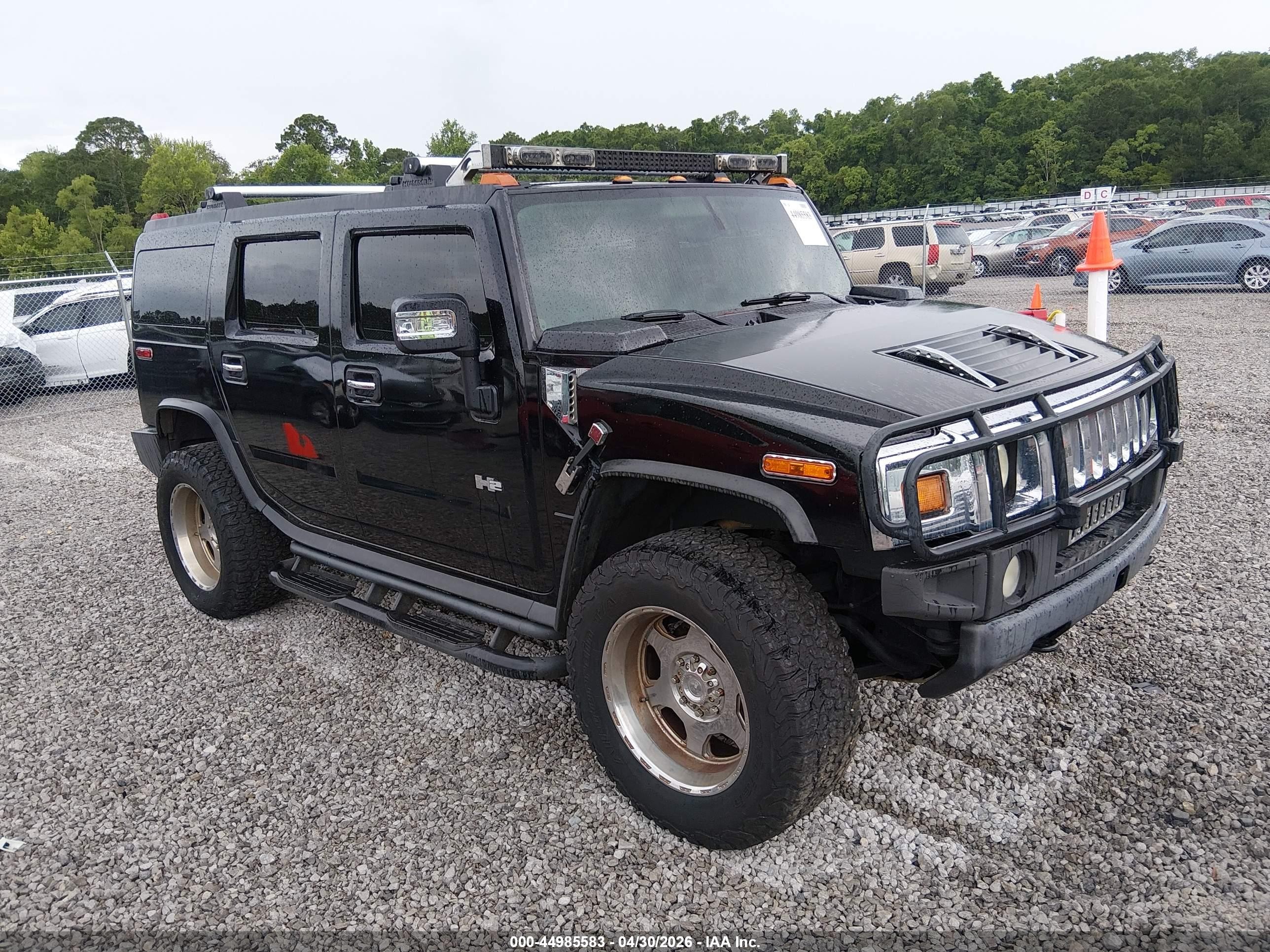 2003 Hummer H2, VIN 5GRGN23U03H127216 — Rear end