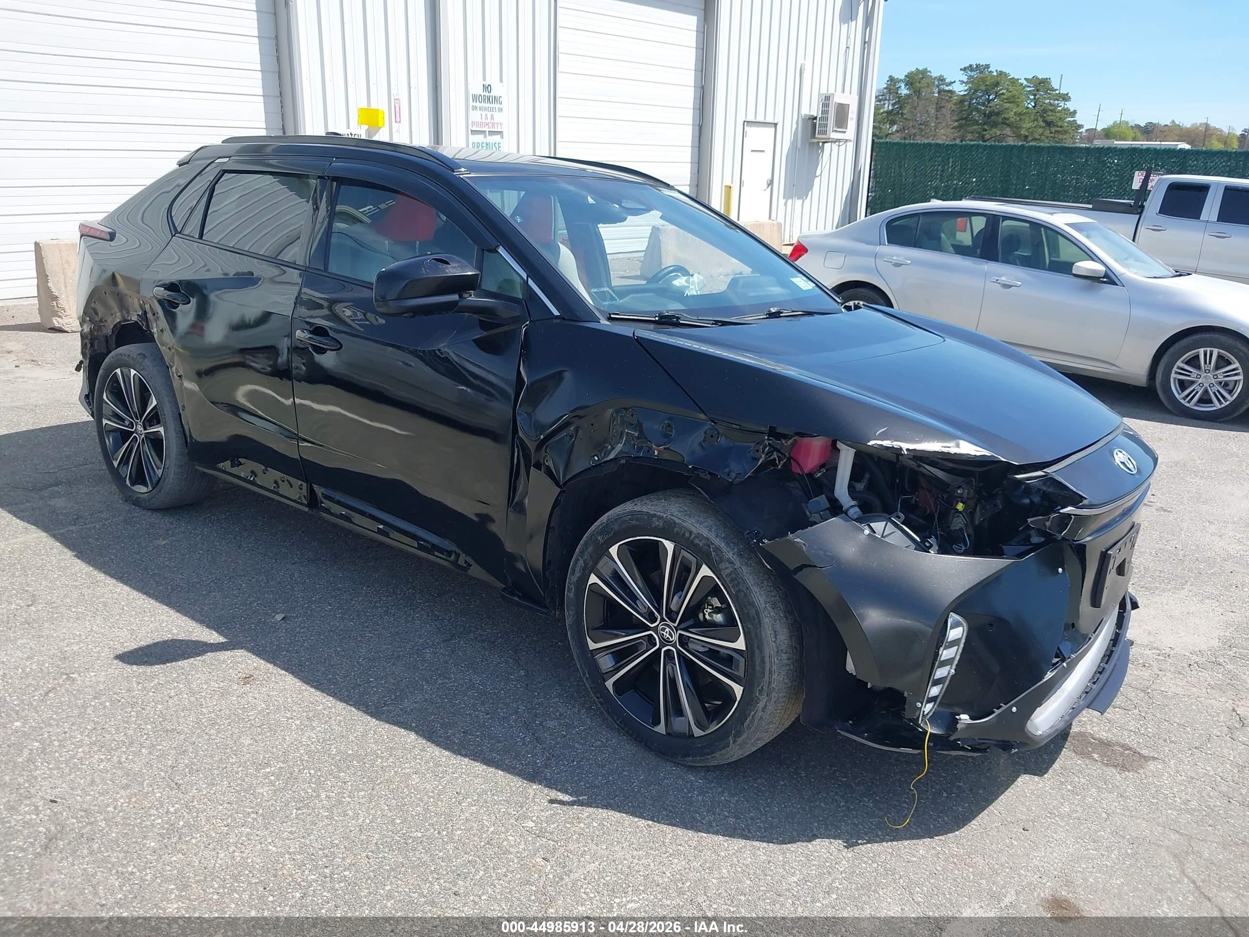 2023 Toyota bZ4X Limited, VIN JTMABACA0PA033982 — Side