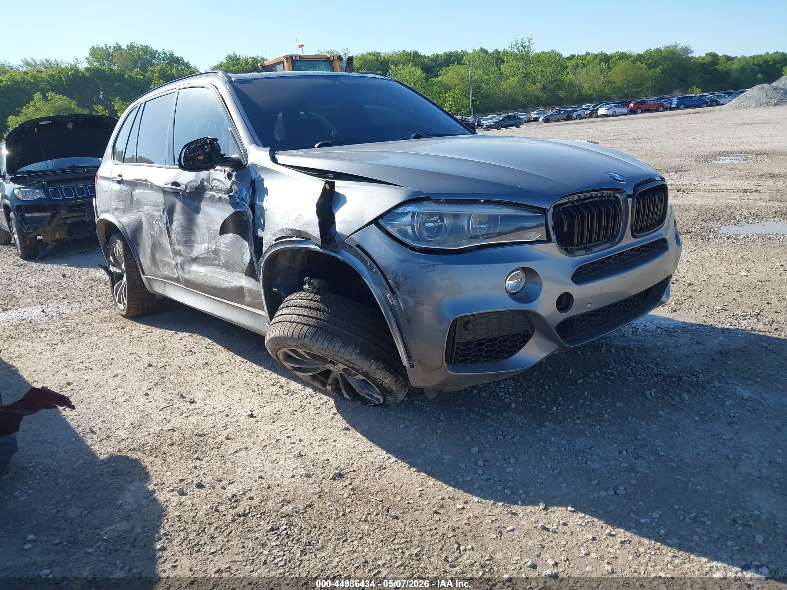 2015 BMW X5 xDrive50i, VIN 5UXKR6C53F0J75486 — Side