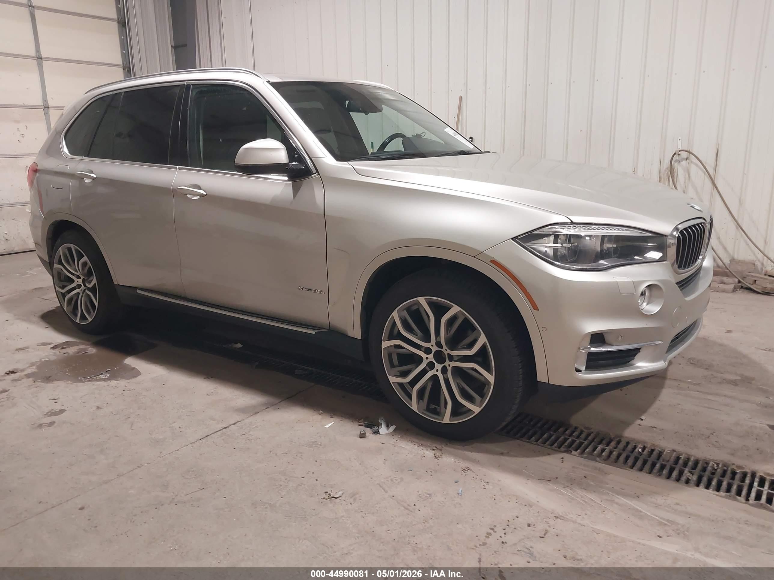 2015 BMW X5 xDrive35i, VIN 5UXKR0C51F0K57990 — Rear end