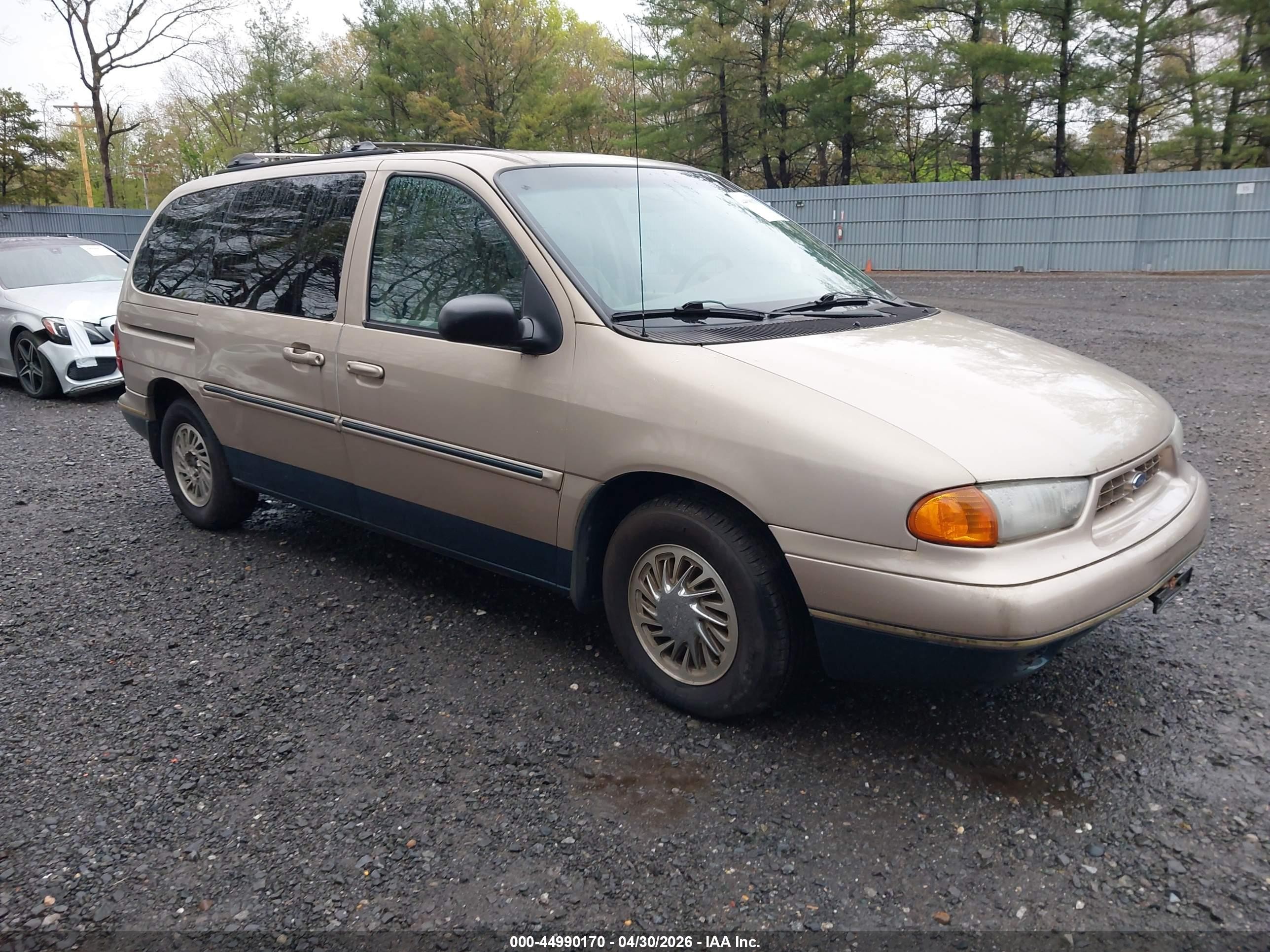 1998 Ford Windstar LX, VIN 2FMZA5140WBC91573 — Side
