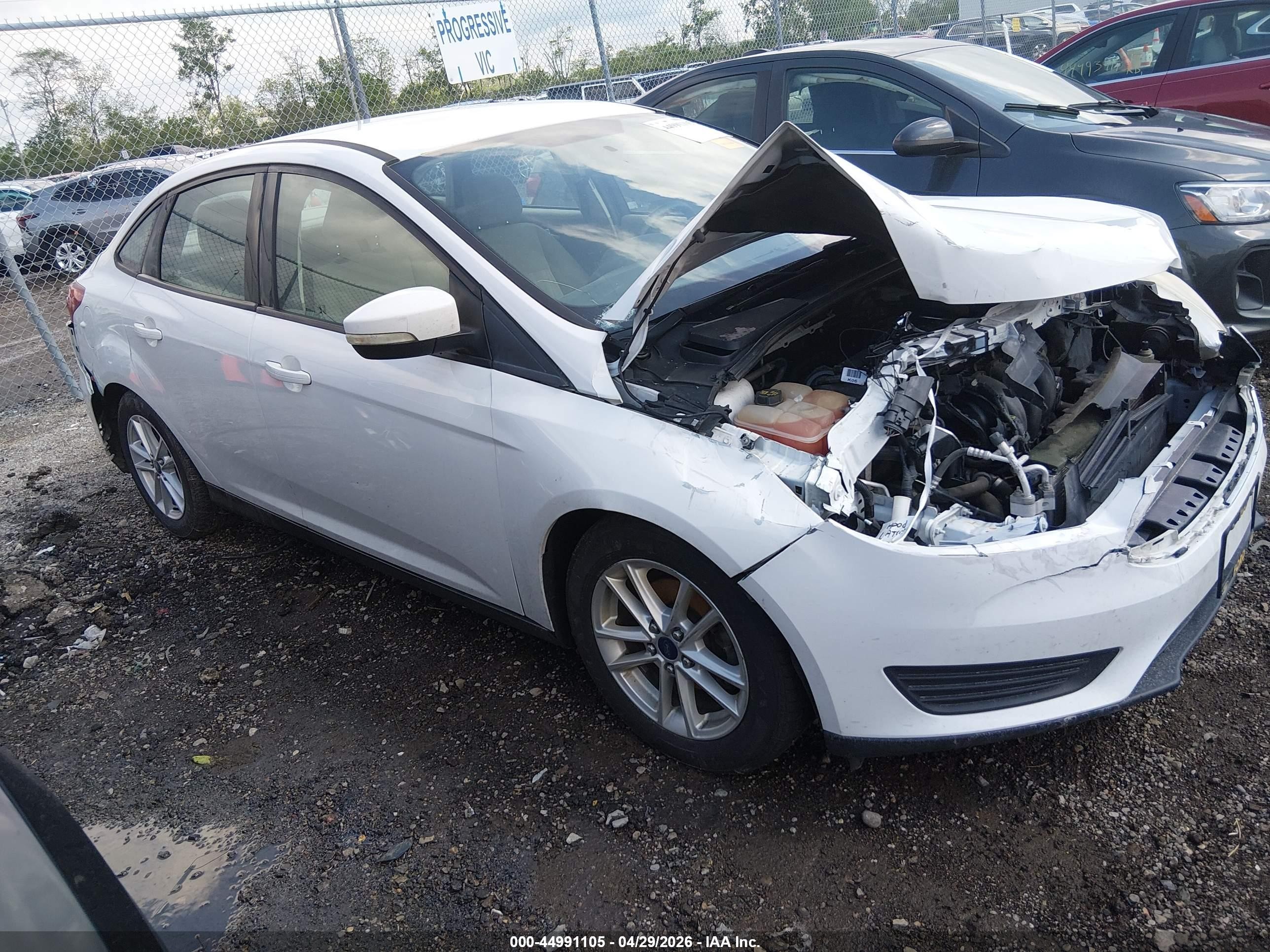 2016 Ford Focus SE, VIN 1FADP3F23GL271298 — All over