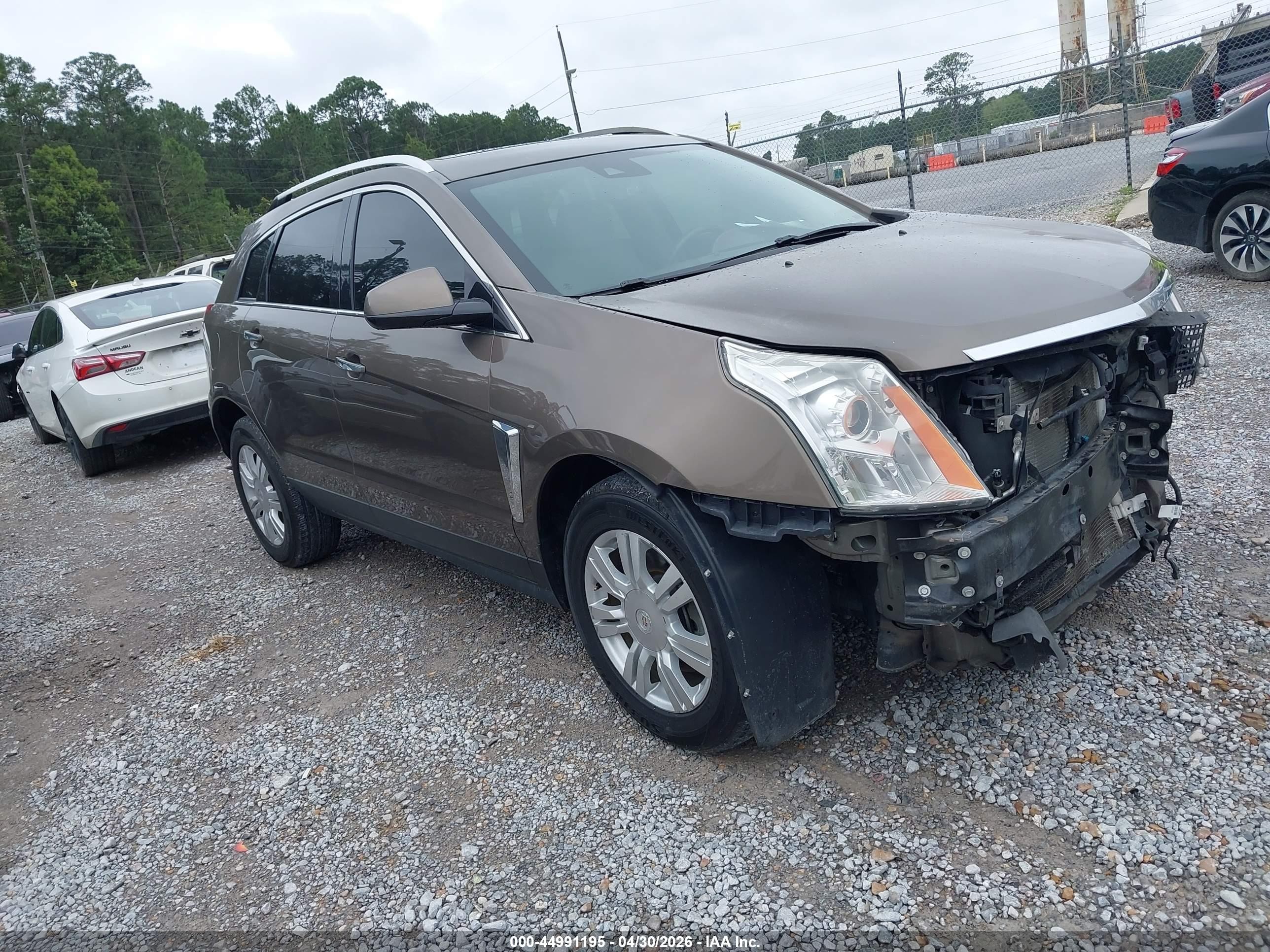 2016 Cadillac SRX Luxury Collection, VIN 3GYFNBE31GS570404 — Front end