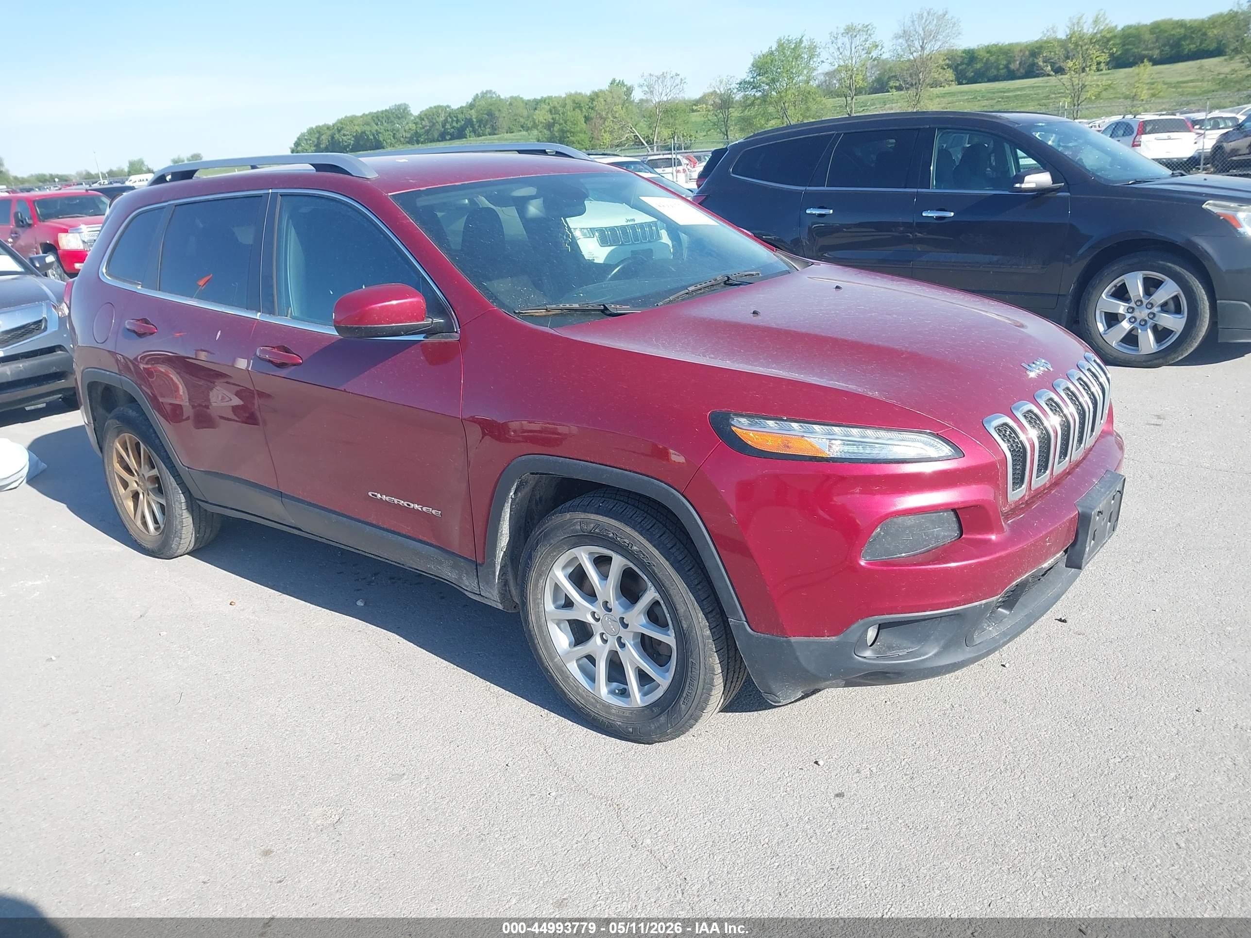 2015 Jeep Cherokee Latitude, VIN 1C4PJMCS4FW649614 — Град