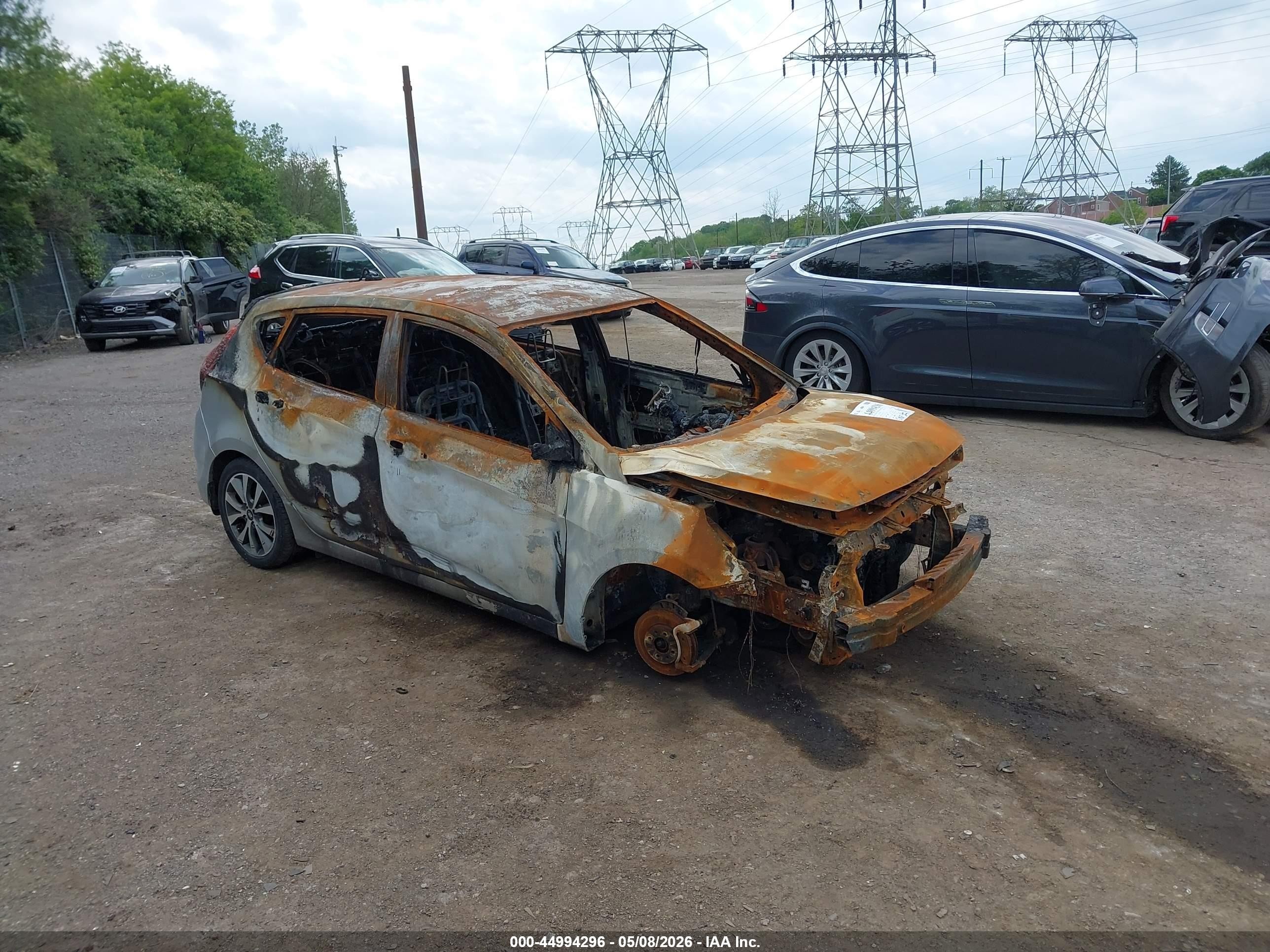 2015 Hyundai Accent Sport, VIN KMHCU5AE5FU229117 — Пожар в салоне