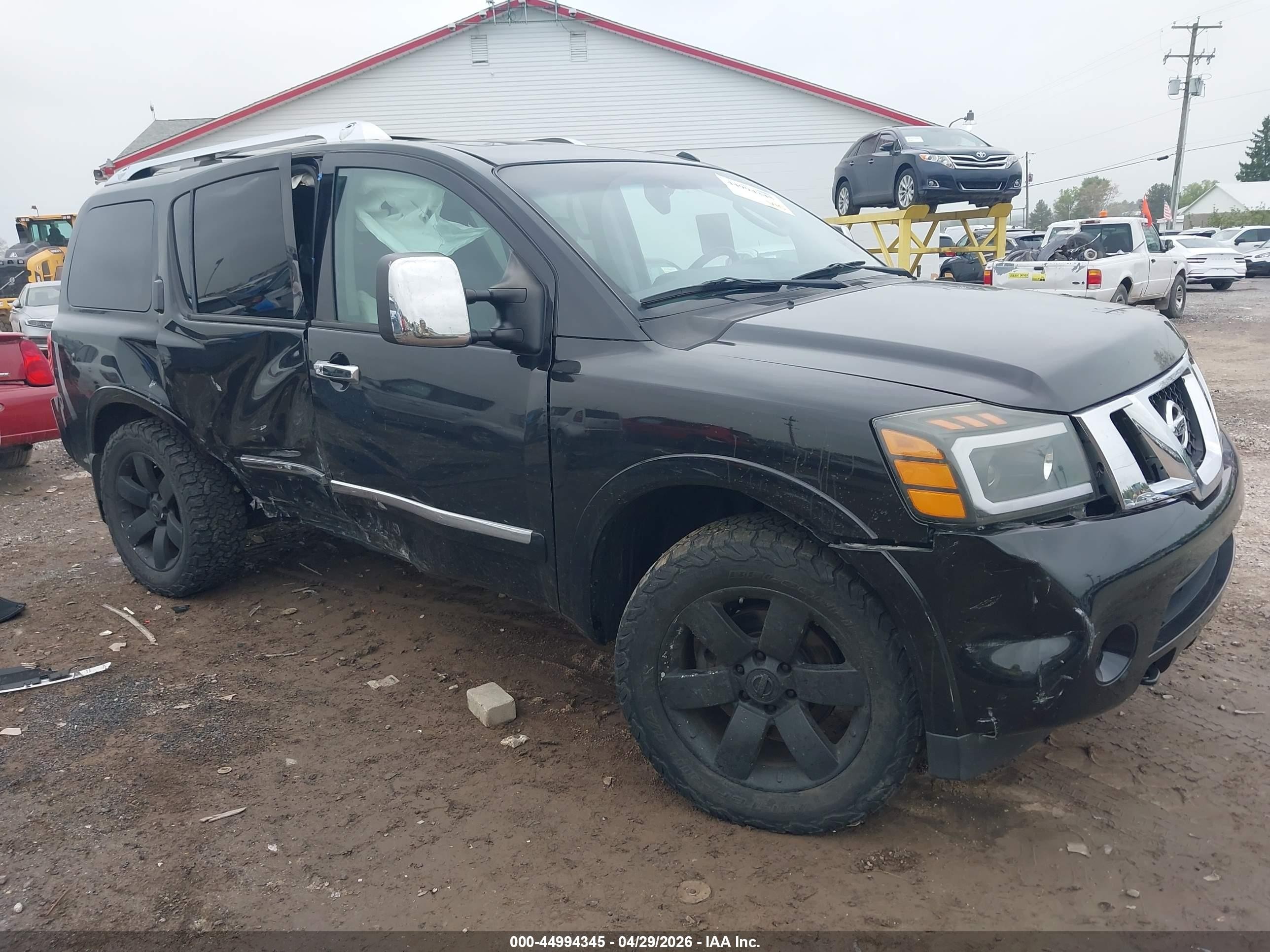 2011 Nissan Armada Platinum, VIN 5N1AA0NC7BN624805 — Side
