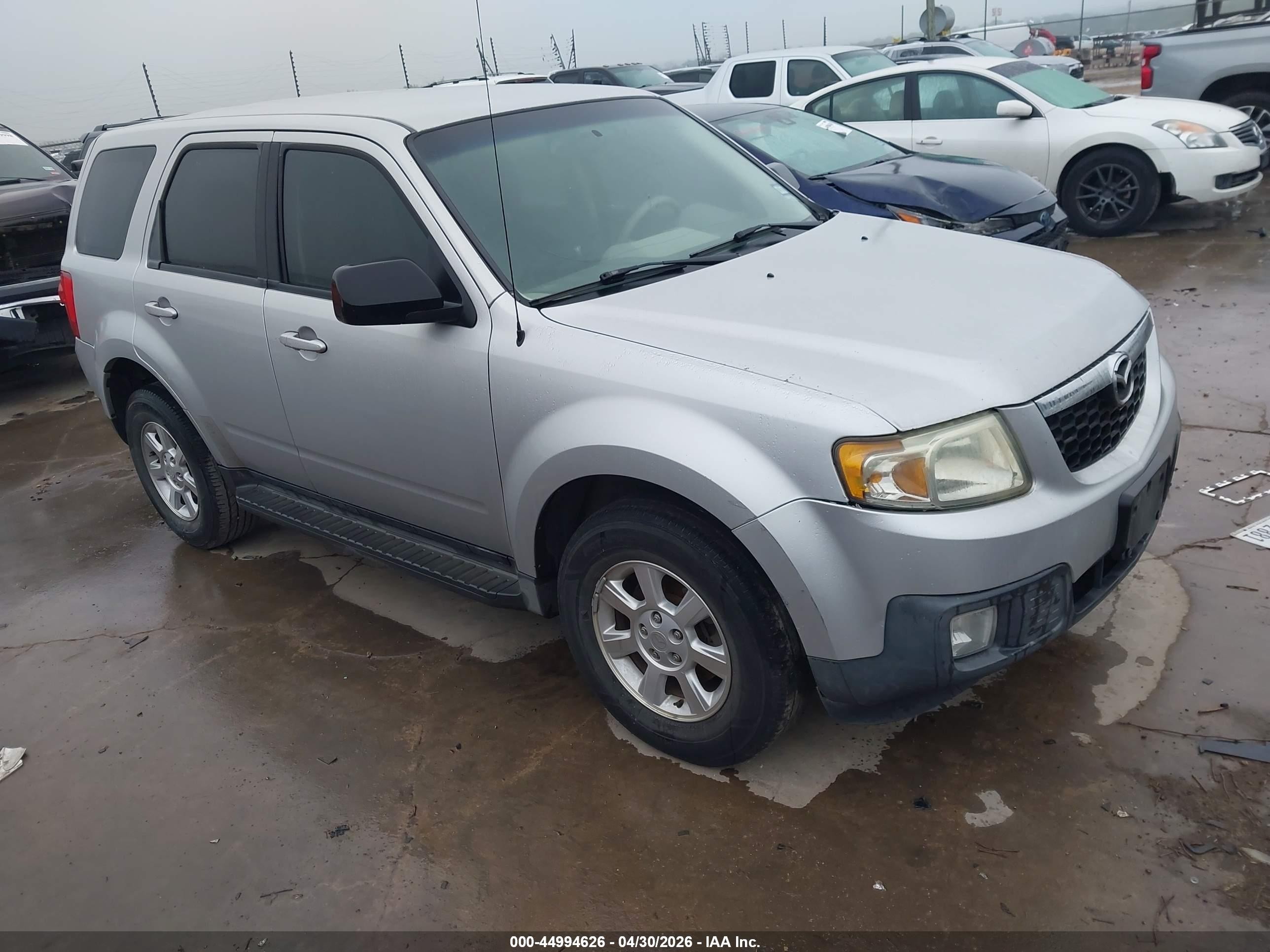 2009 Mazda Tribute Sport, VIN 4F2CZ027X9KM01120 — Обычный износ