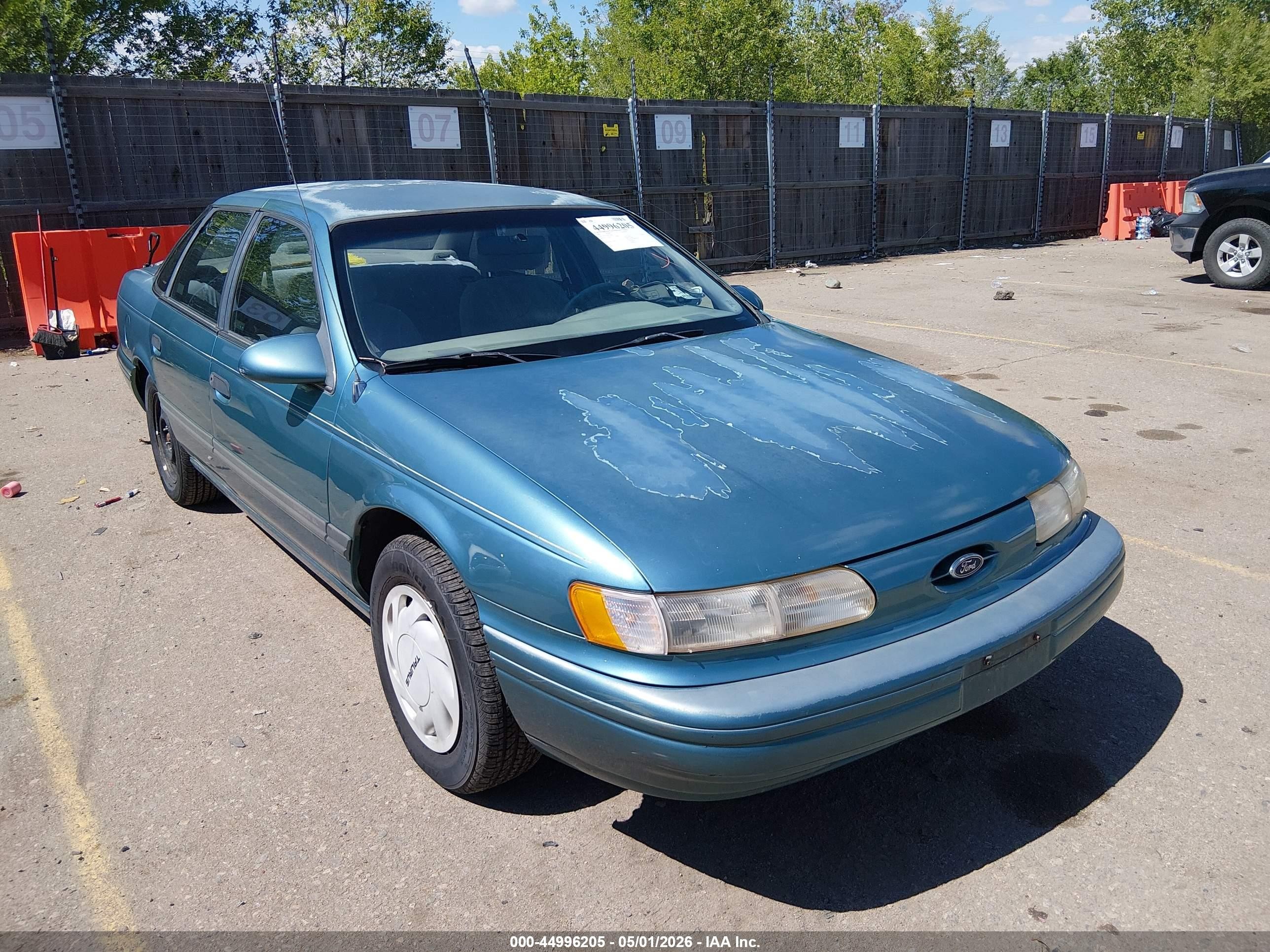 1993 Ford Taurus GL, VIN 1FALP5244PG330611 — Normal wear