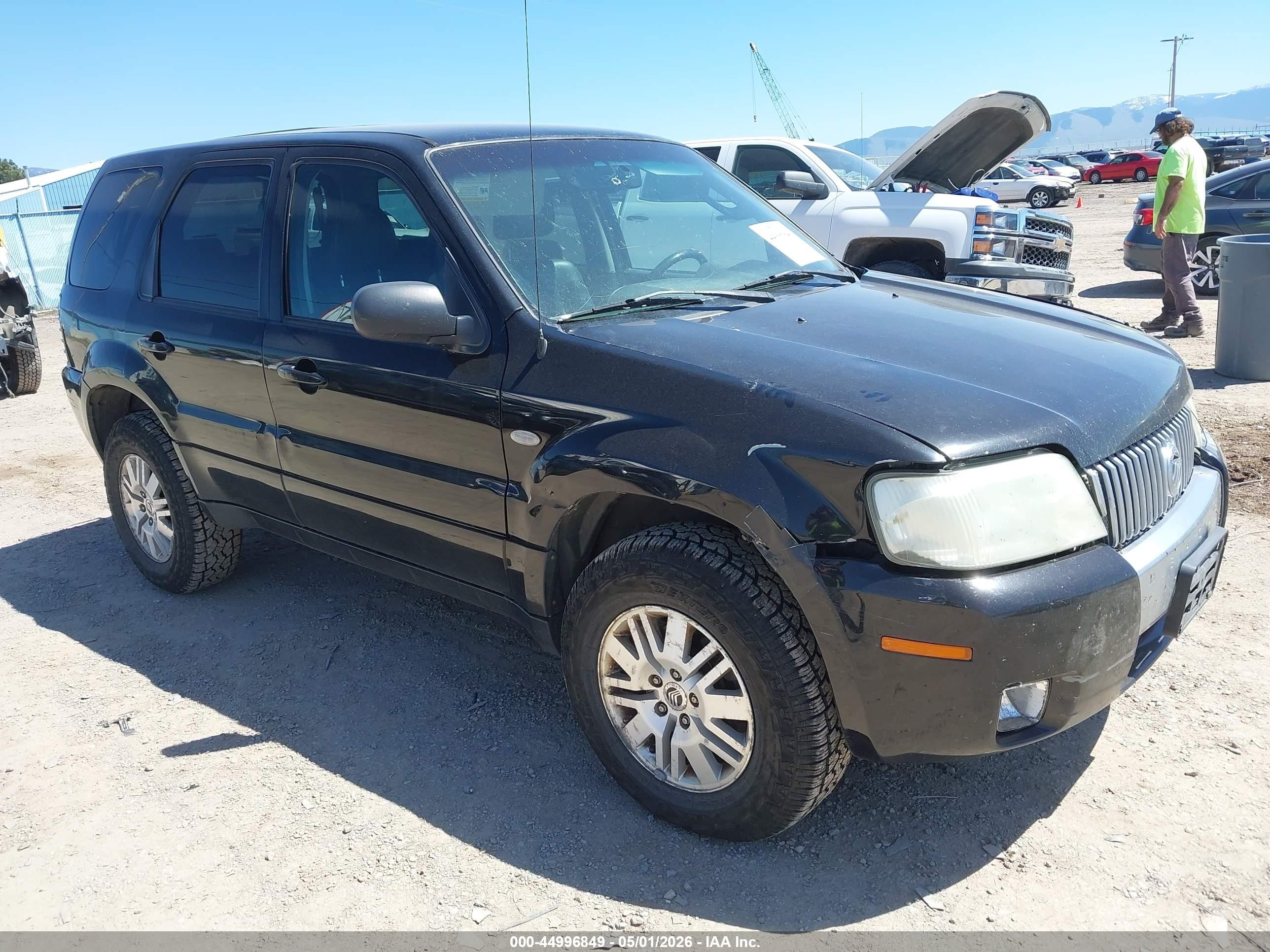 2006 Mercury Mariner Luxury, VIN 4M2CU57106KJ18411 — Side