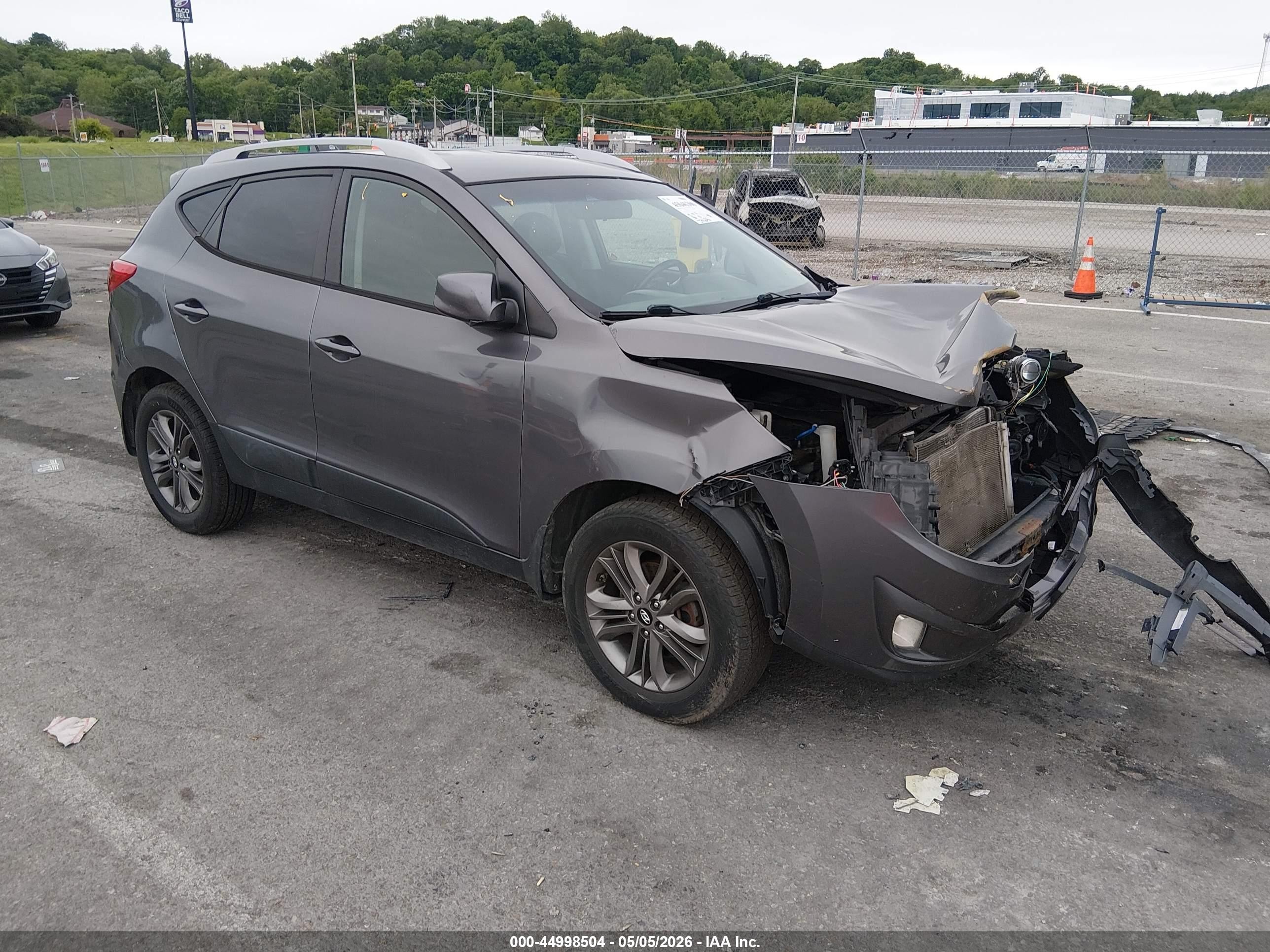 2014 Hyundai Tucson SE, VIN KM8JU3AGXEU925001 — Перед