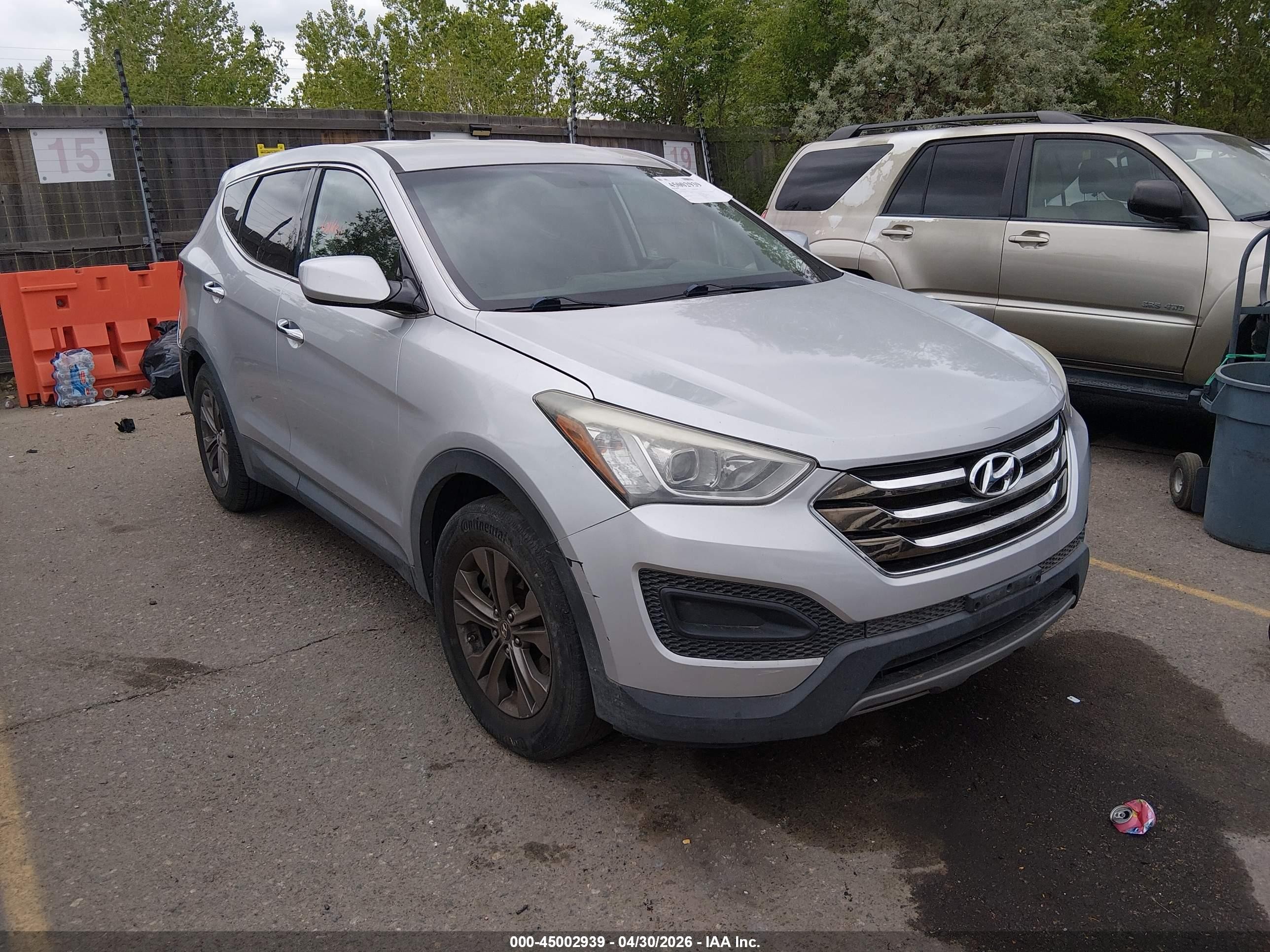 2013 Hyundai Santa Fe Sport, VIN 5XYZTDLB5DG094041 — Rear end