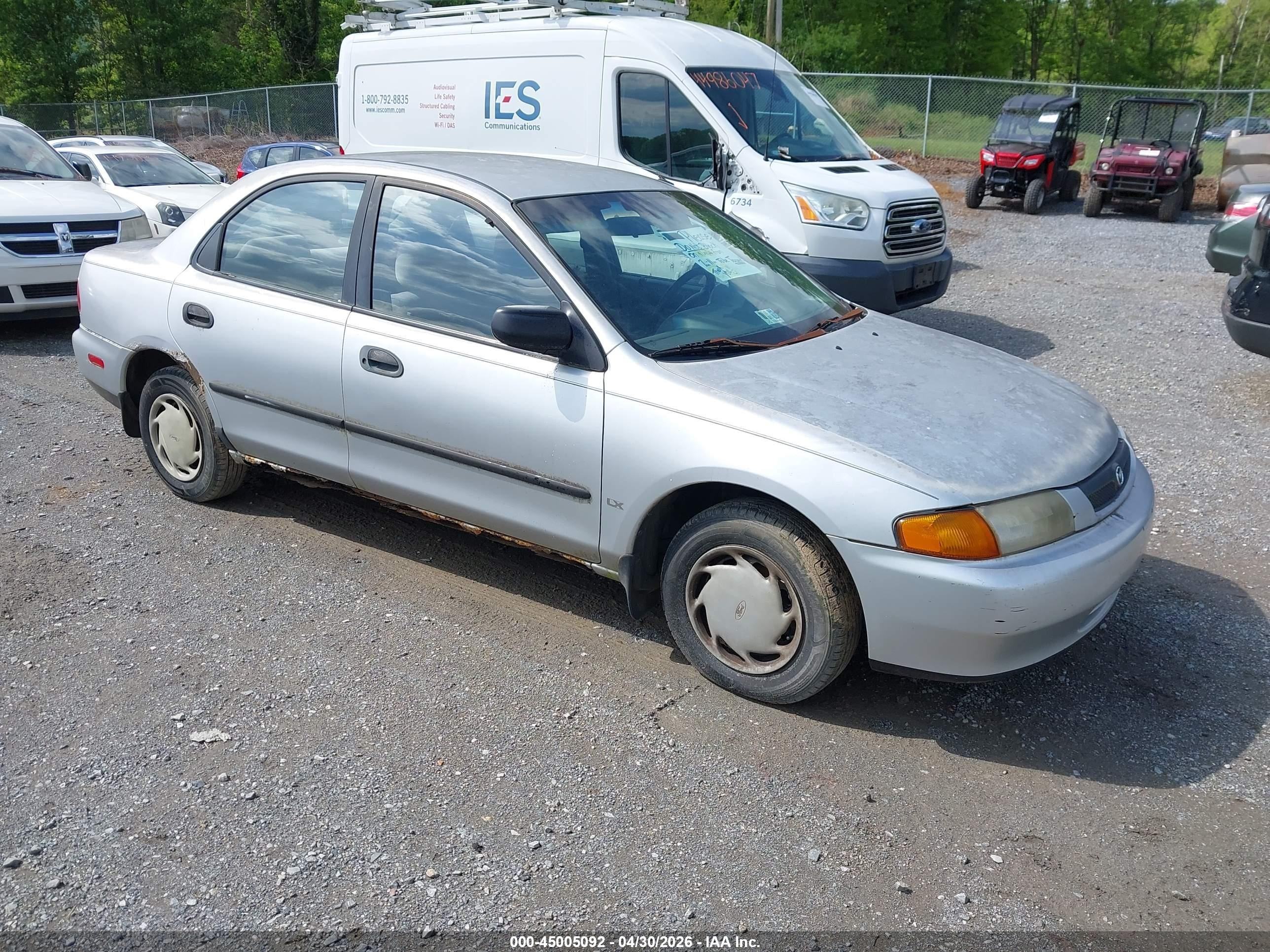 1998 Mazda Protege DX, VIN JM1BC1414W0180780 — Normal wear