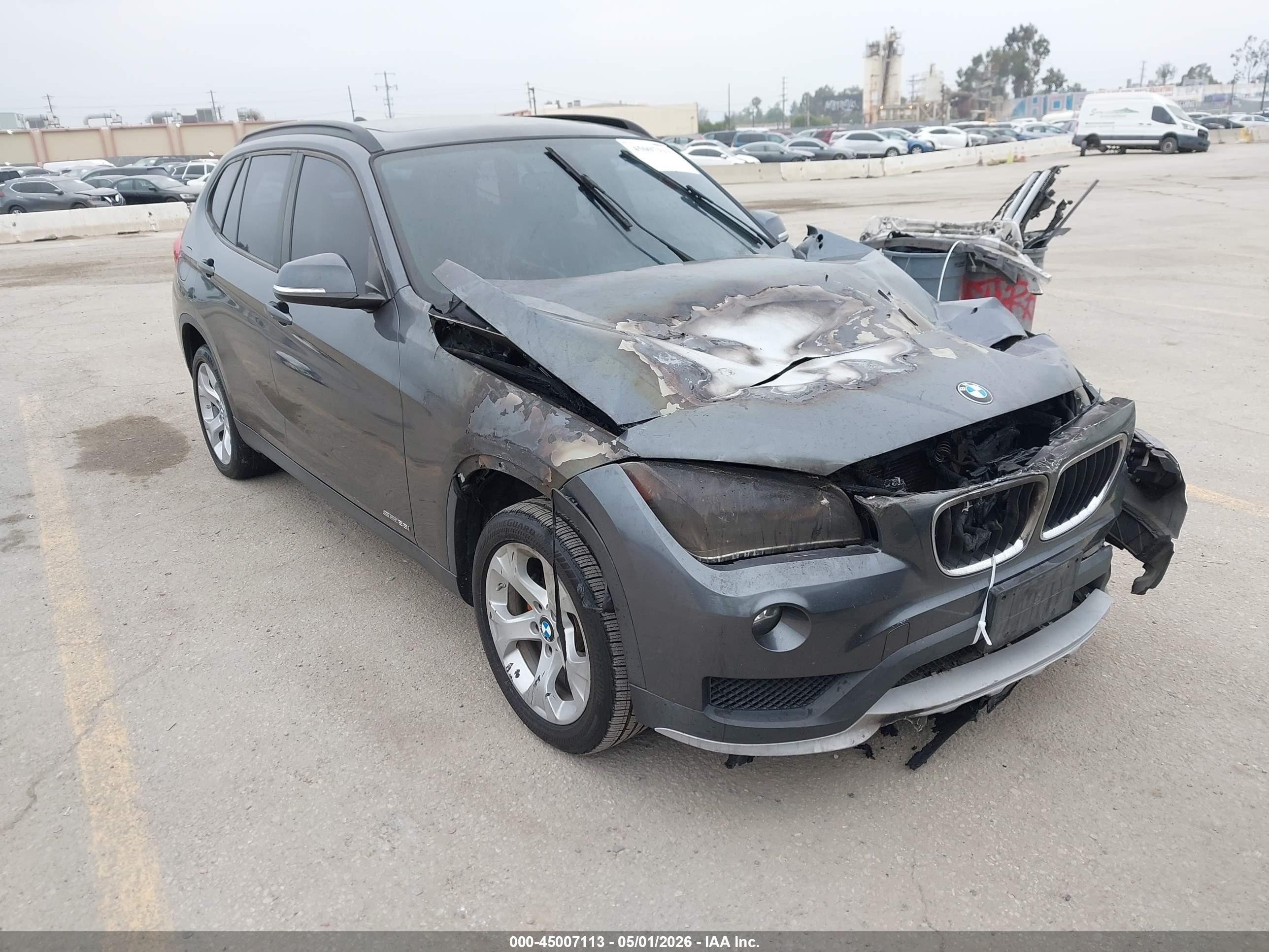 2015 BMW X1 sDrive28i, VIN WBAVM1C56FV318933 — Engine fire