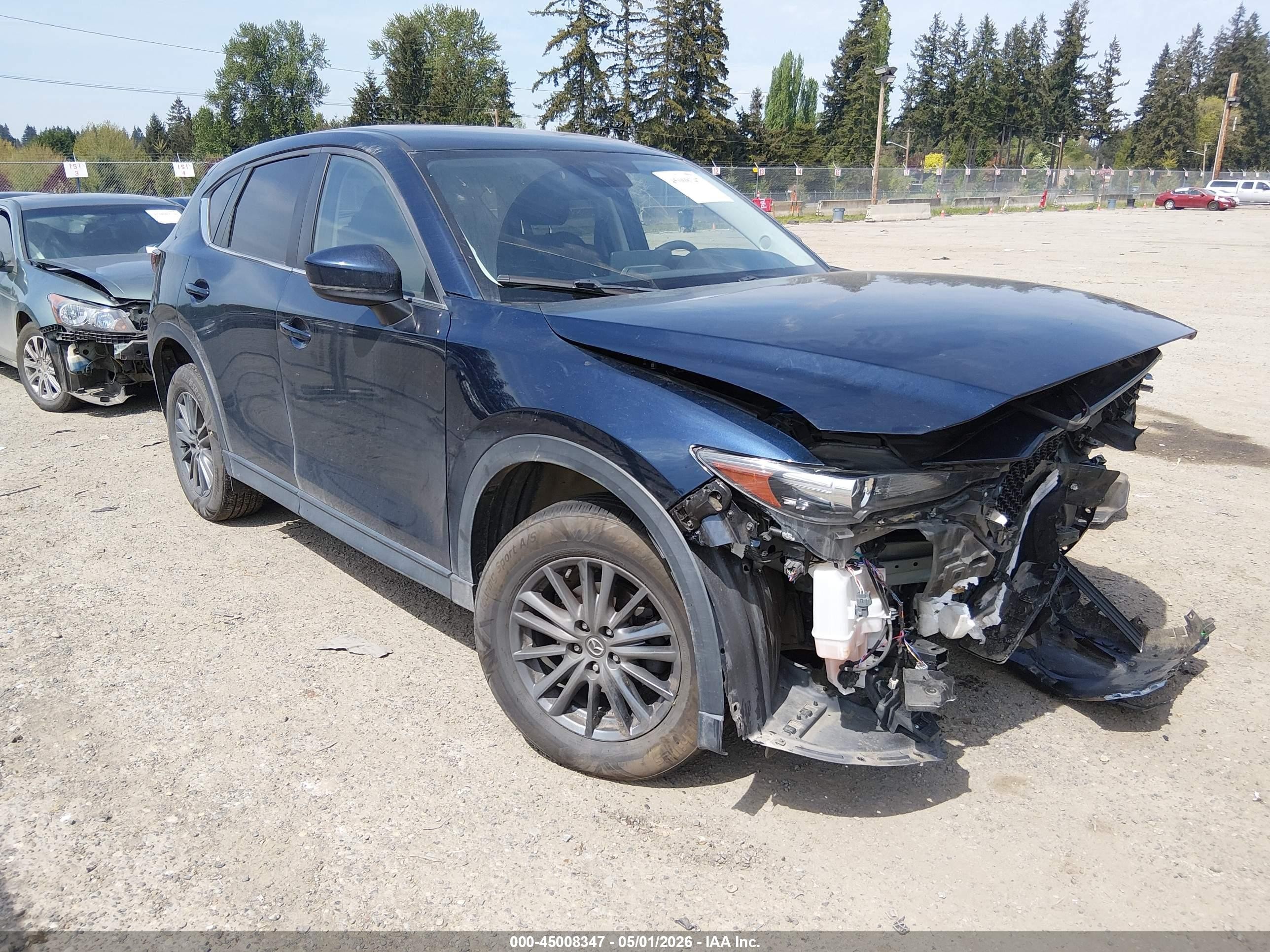 2021 Mazda CX-5 Touring, VIN JM3KFBCM3M0447940 — Front end