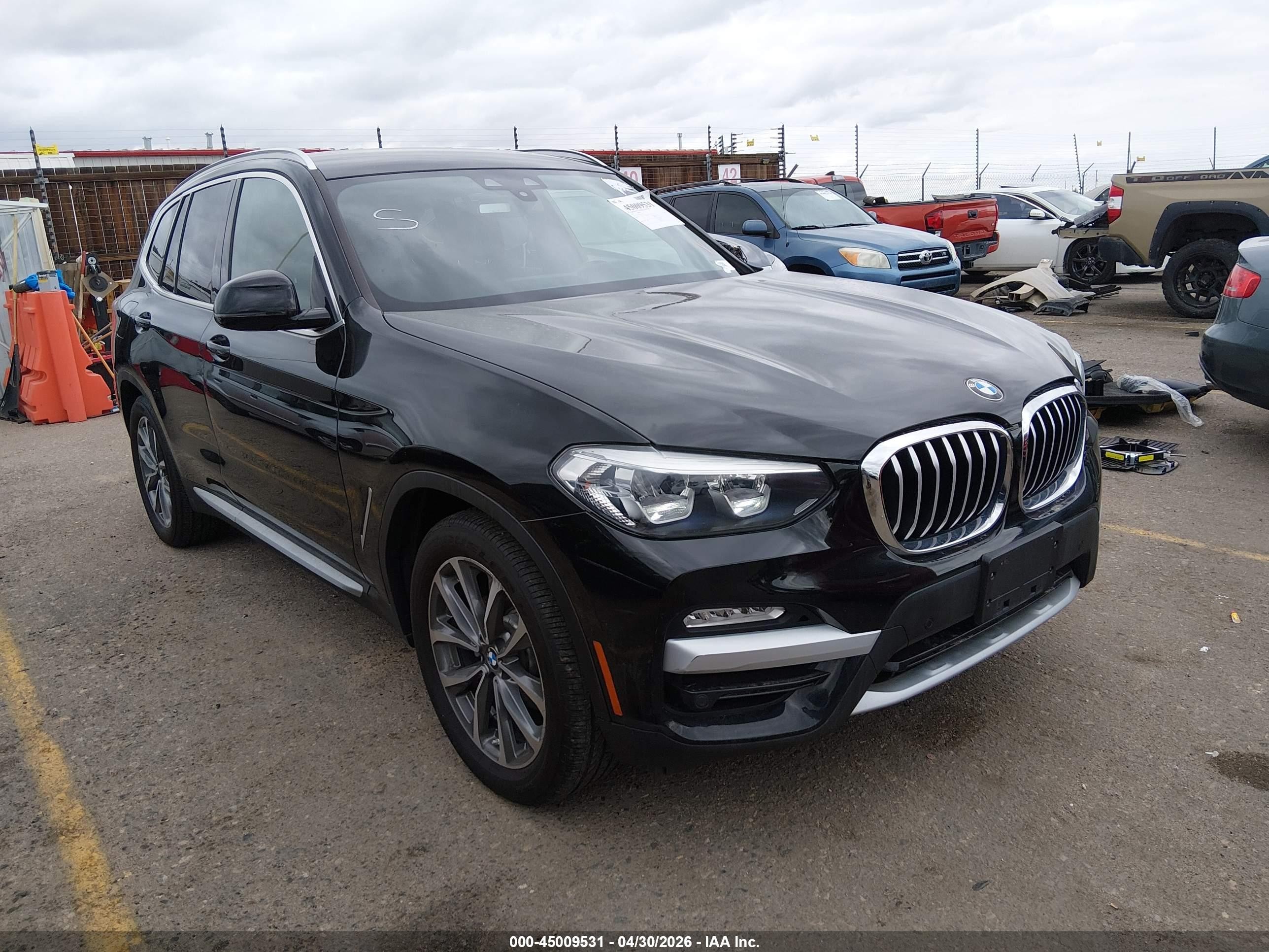 2019 BMW X3 xDrive30i, VIN 5UXTR9C55KLP95951 — Side
