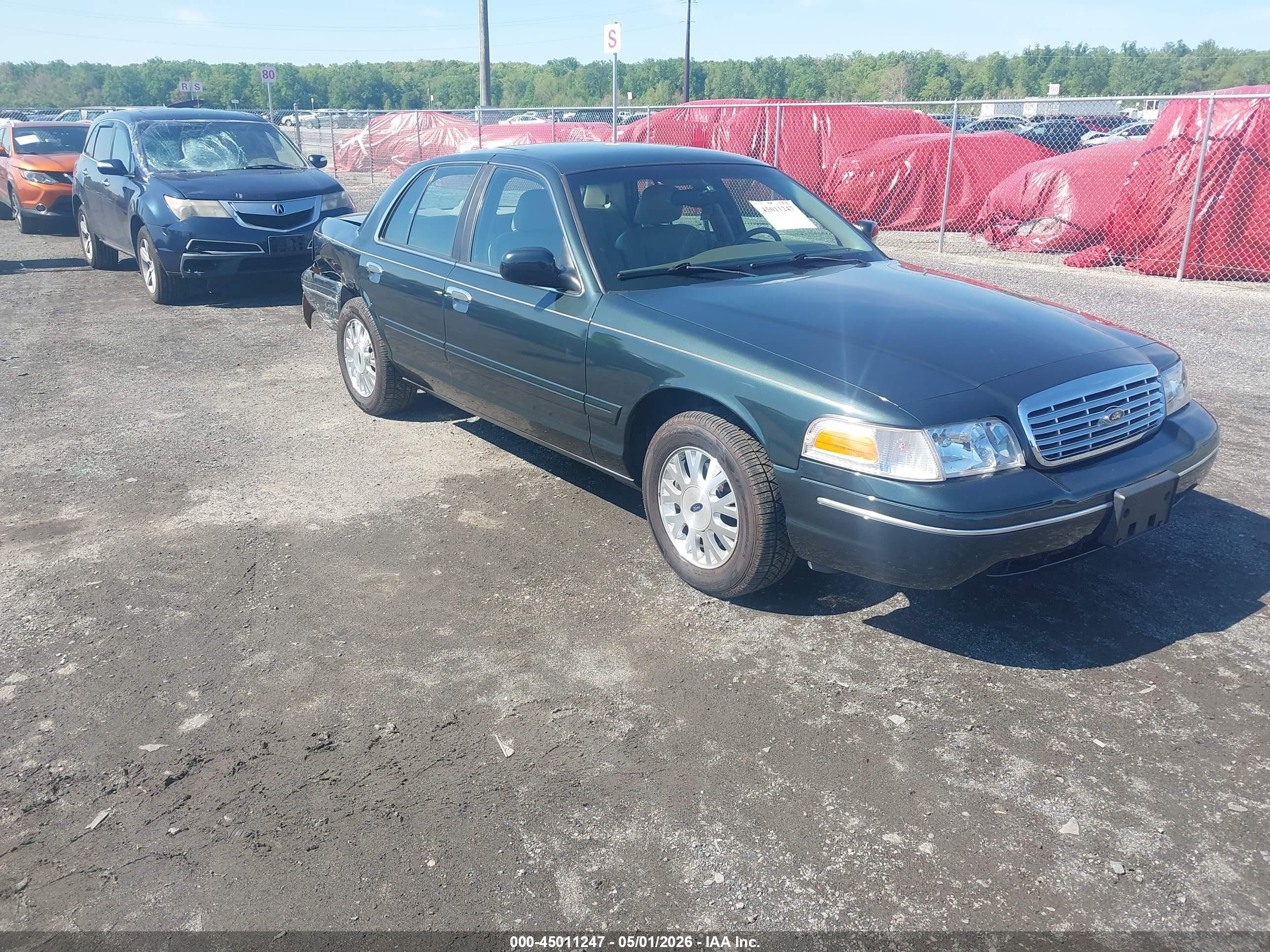 2003 Ford Crown Victoria LX, VIN 2FAFP74W63X101021 — Rear end