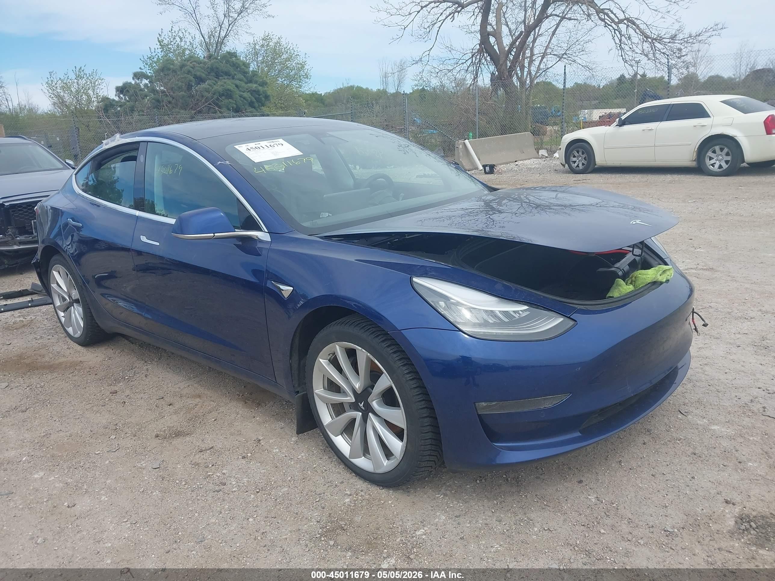 2019 Tesla Model 3 Long Range, VIN 5YJ3E1EB6KF413396 — Water / flood