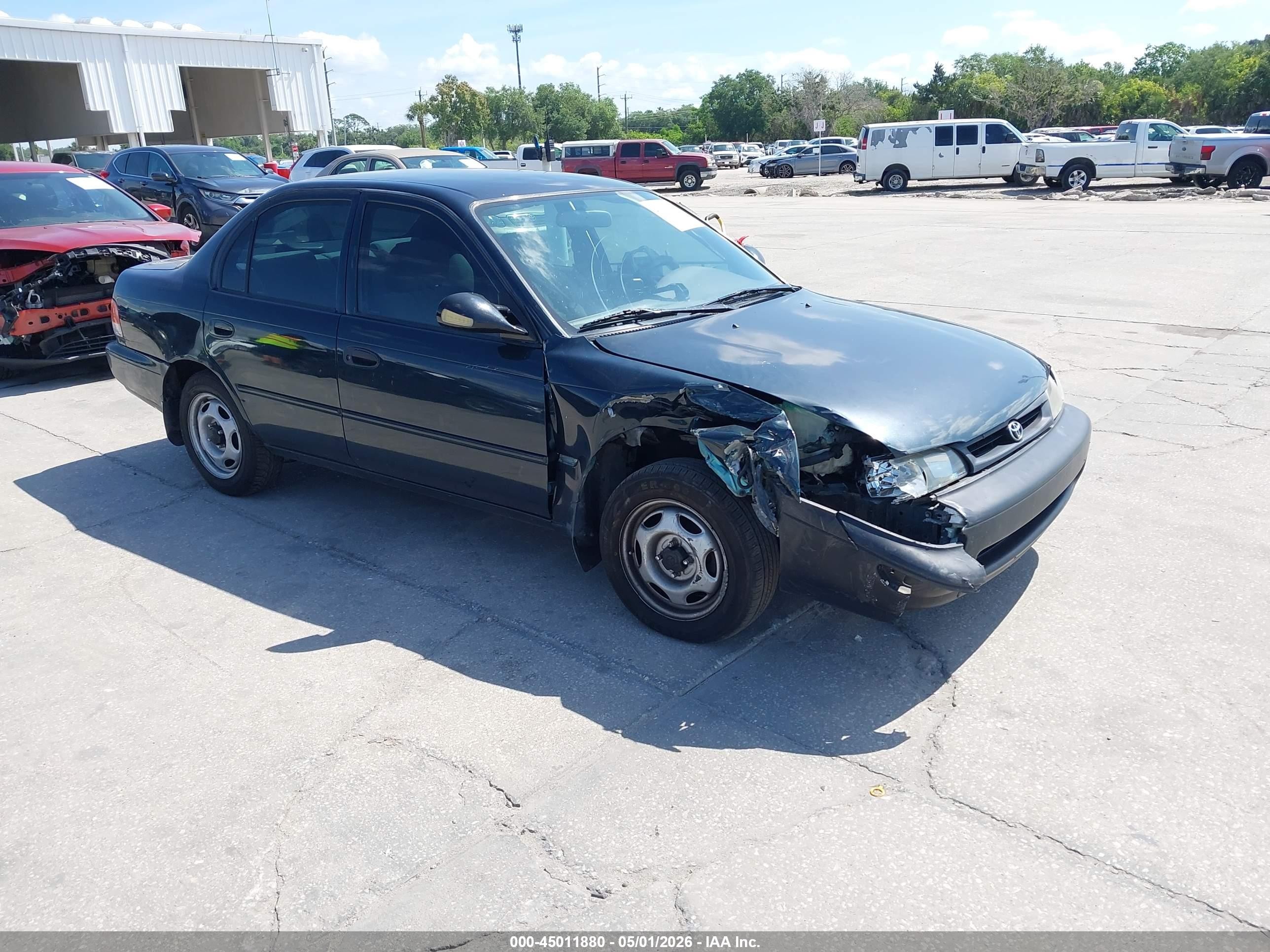 1996 Toyota Corolla, VIN 1NXBA02E2TZ433049 — Side