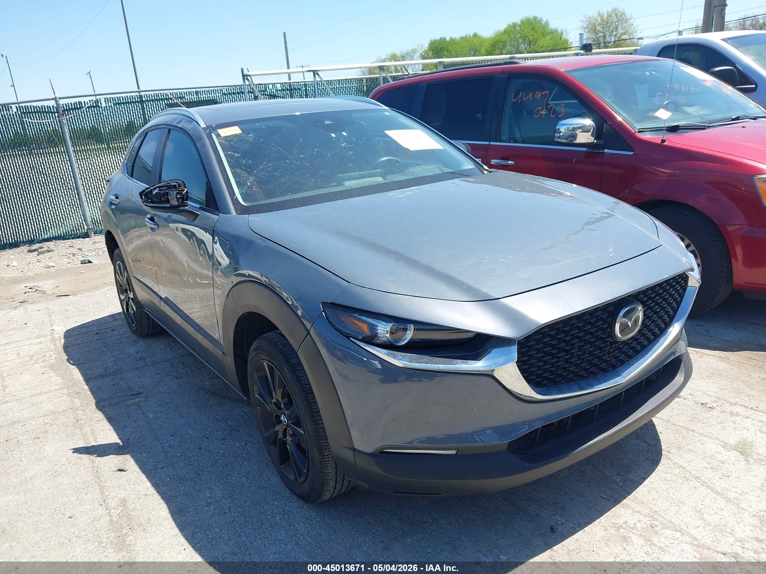 2023 Mazda CX-30 S Preferred, VIN 3MVDMBCM9PM549976 — Hail