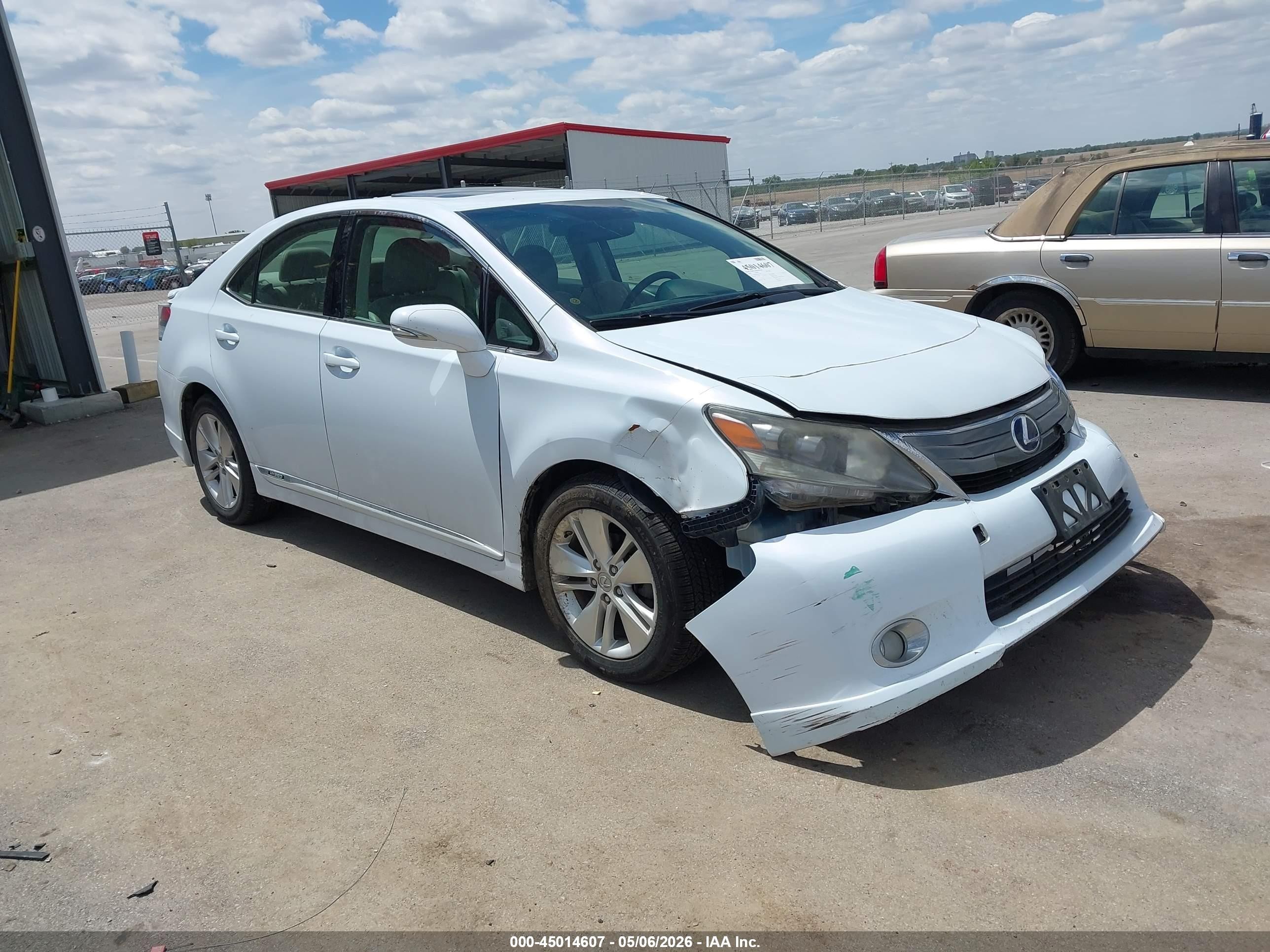 2010 Lexus HS 250h Premium, VIN JTHBB1BA5A2014267 — Side