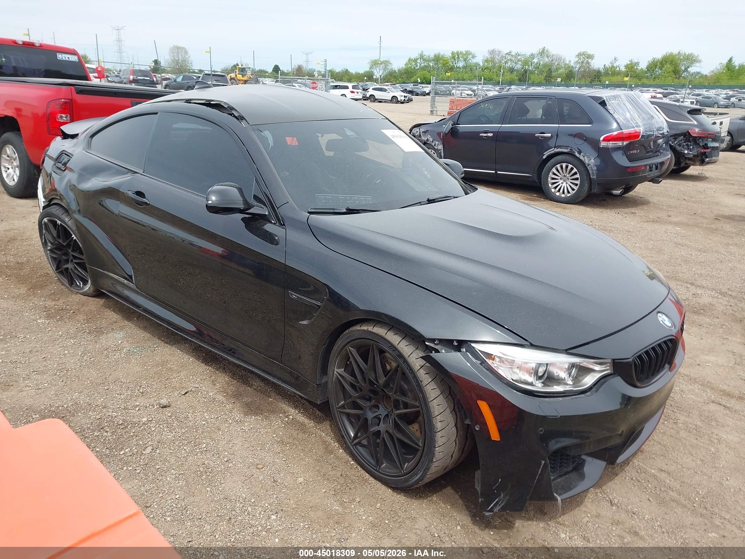 2017 BMW M4, VIN WBS3R9C31HA014064 — Side