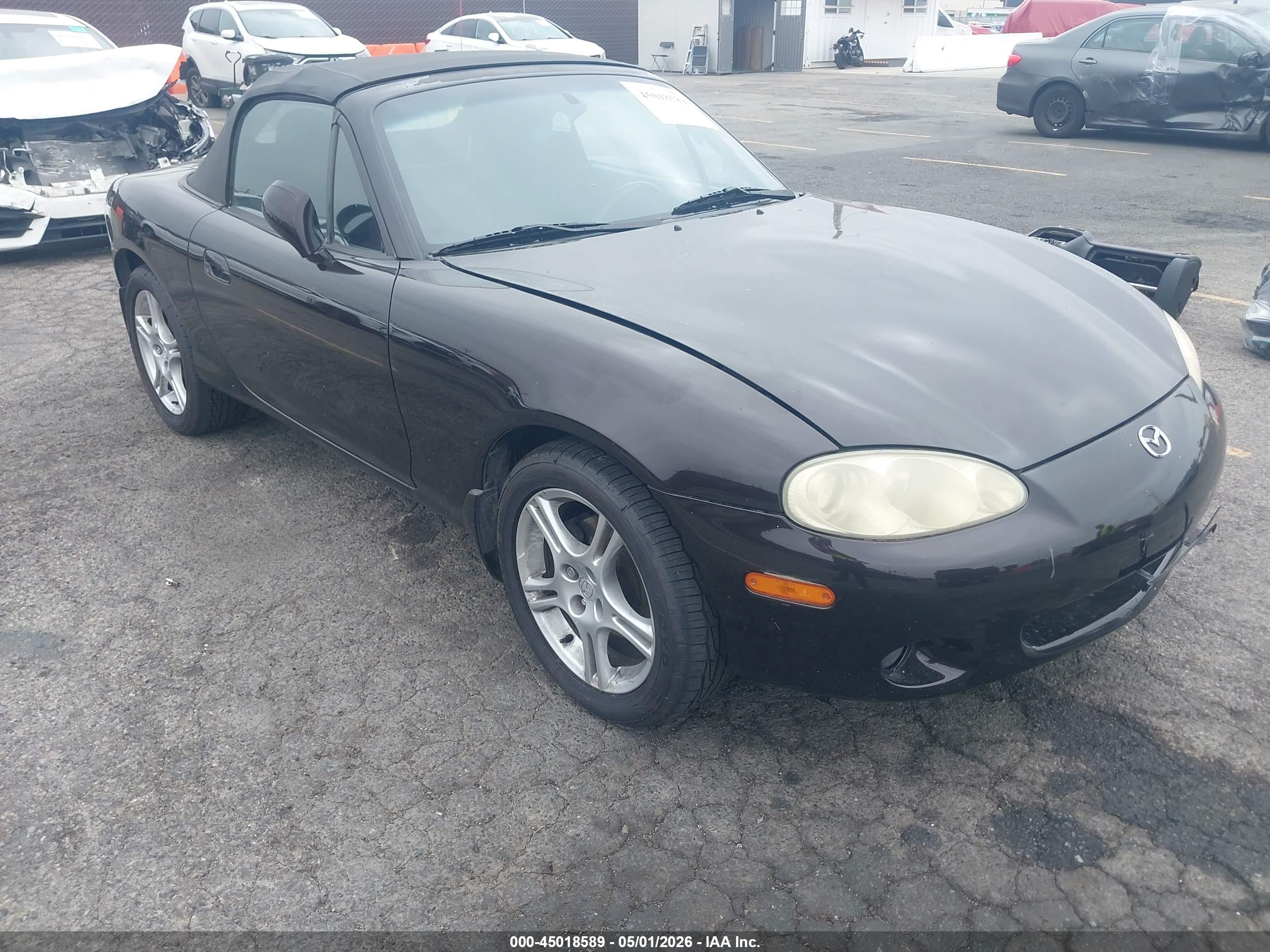 2004 Mazda MX-5 Miata LS, VIN JM1NB353240403469 — Vandalism