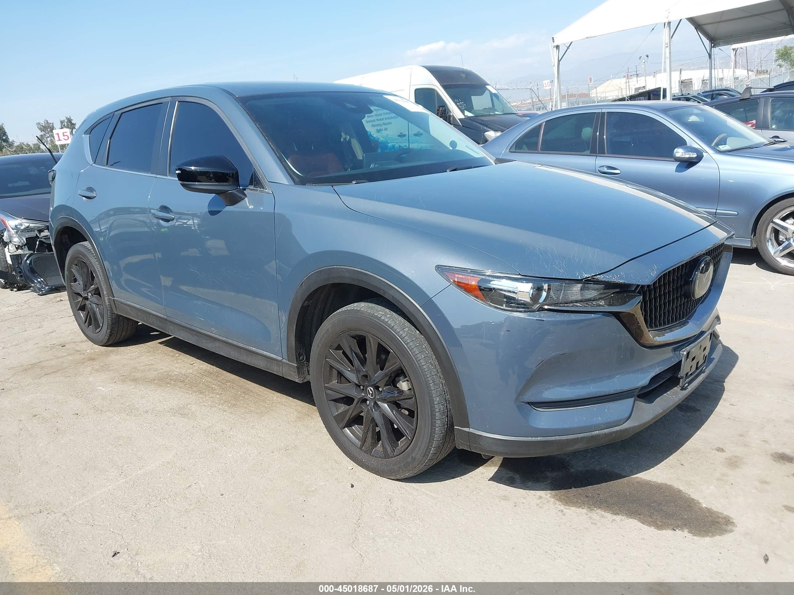 2021 Mazda CX-5 Touring, VIN JM3KFACM6M0383483 — Rear end