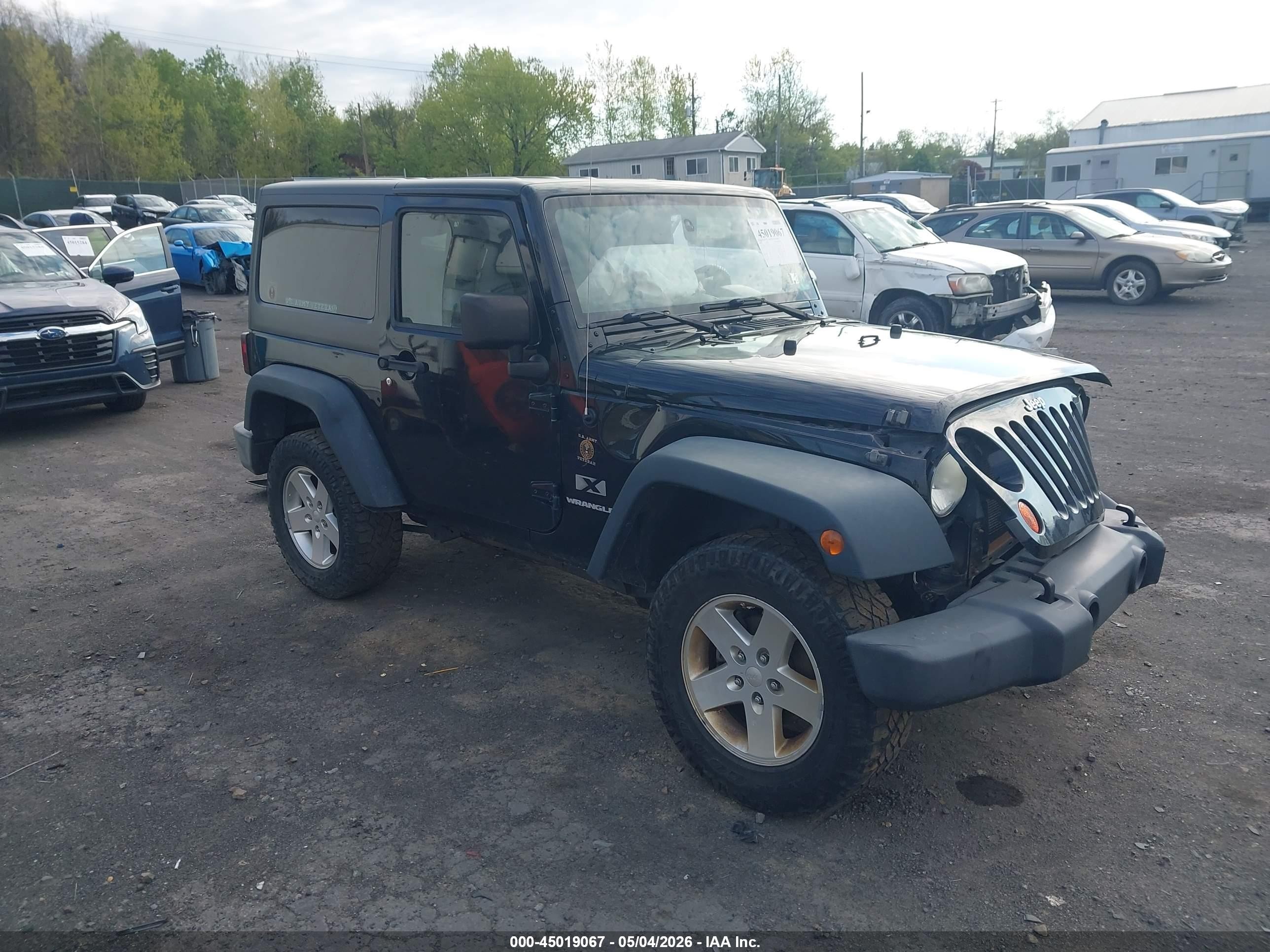 2009 Jeep Wrangler X, VIN 1J4FA24109L755404 — Front end
