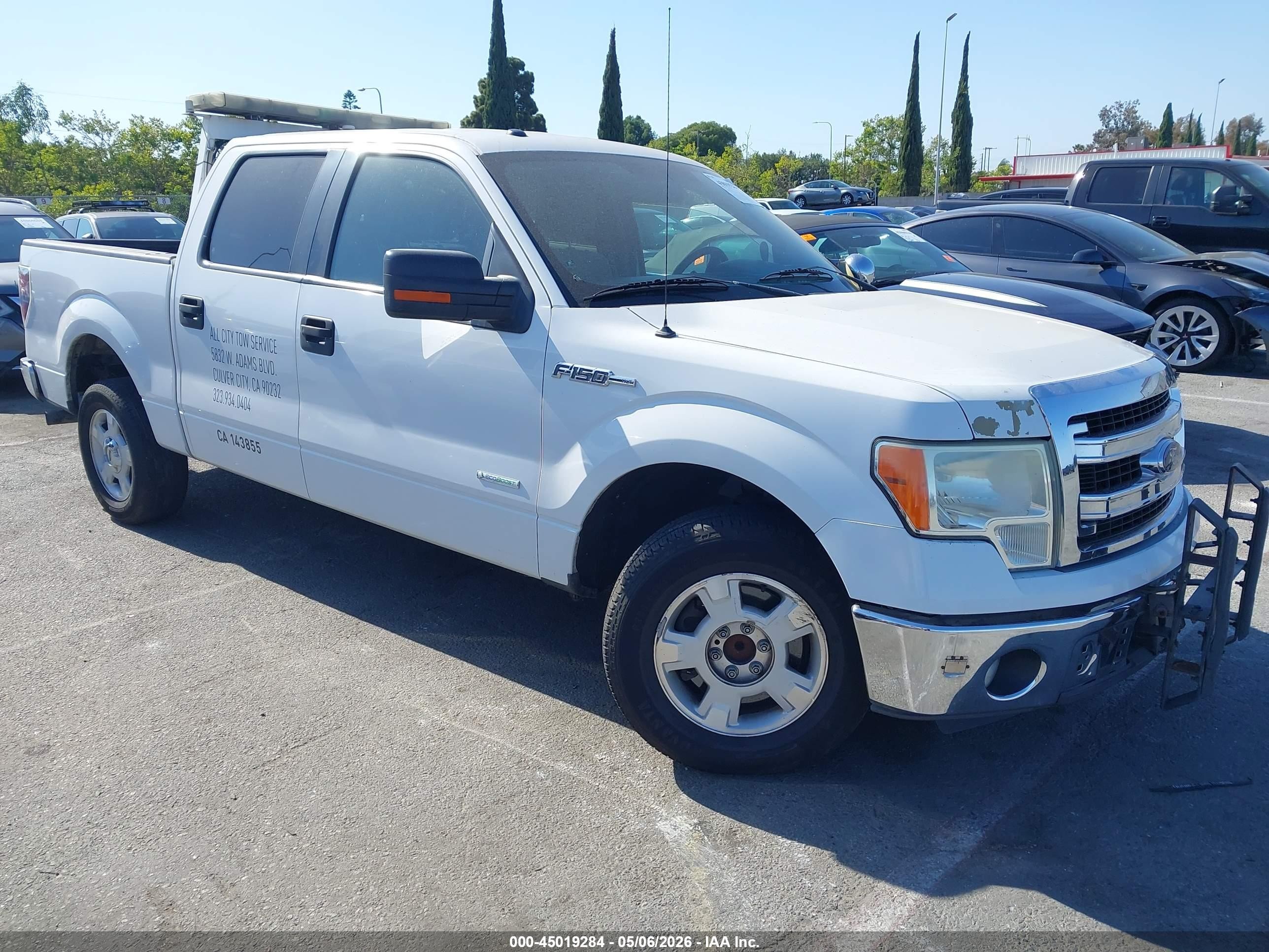 2014 Ford F-150 Lariat, VIN 1FTFW1CT1EKD39429 — Side