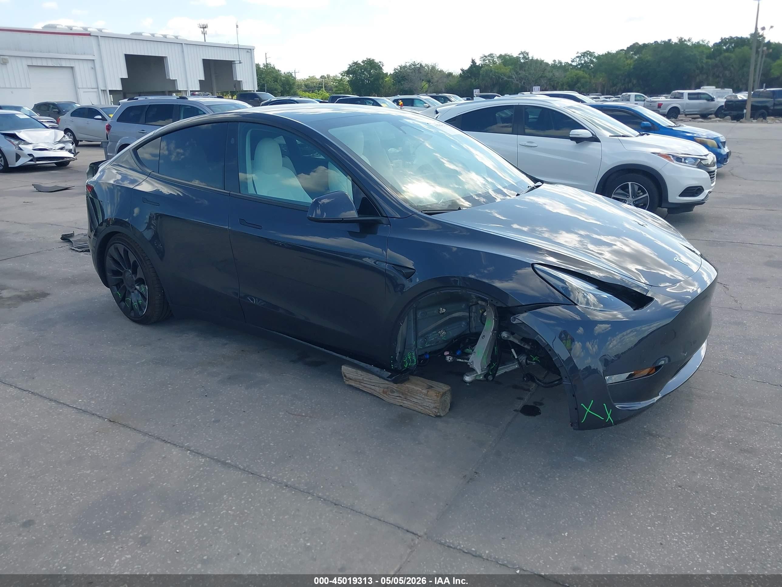 2024 Tesla Model Y Performance, VIN 7SAYGDEF0RF048733 — Side