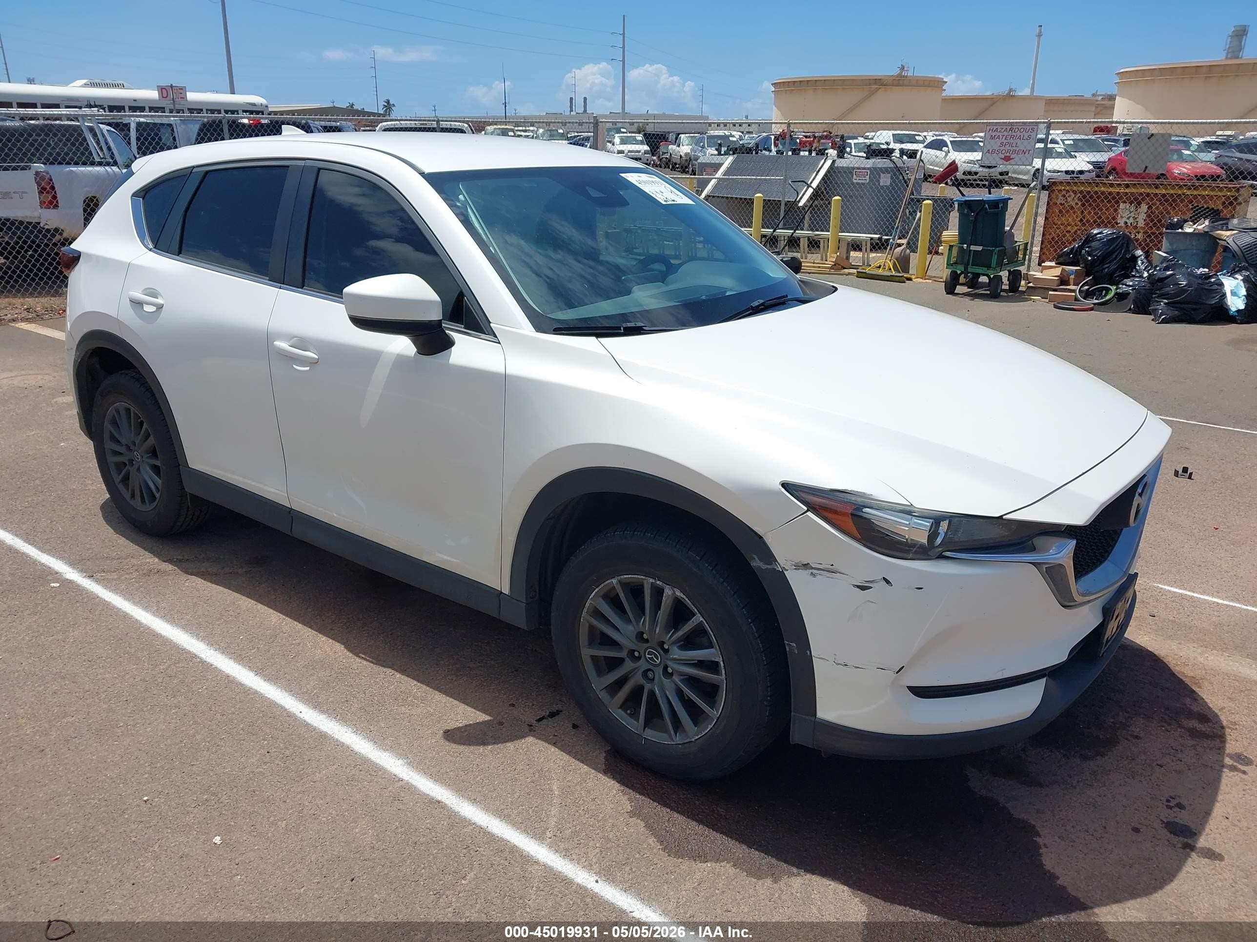 2019 Mazda CX-5 Sport, VIN JM3KFABM5K1699014 — Side