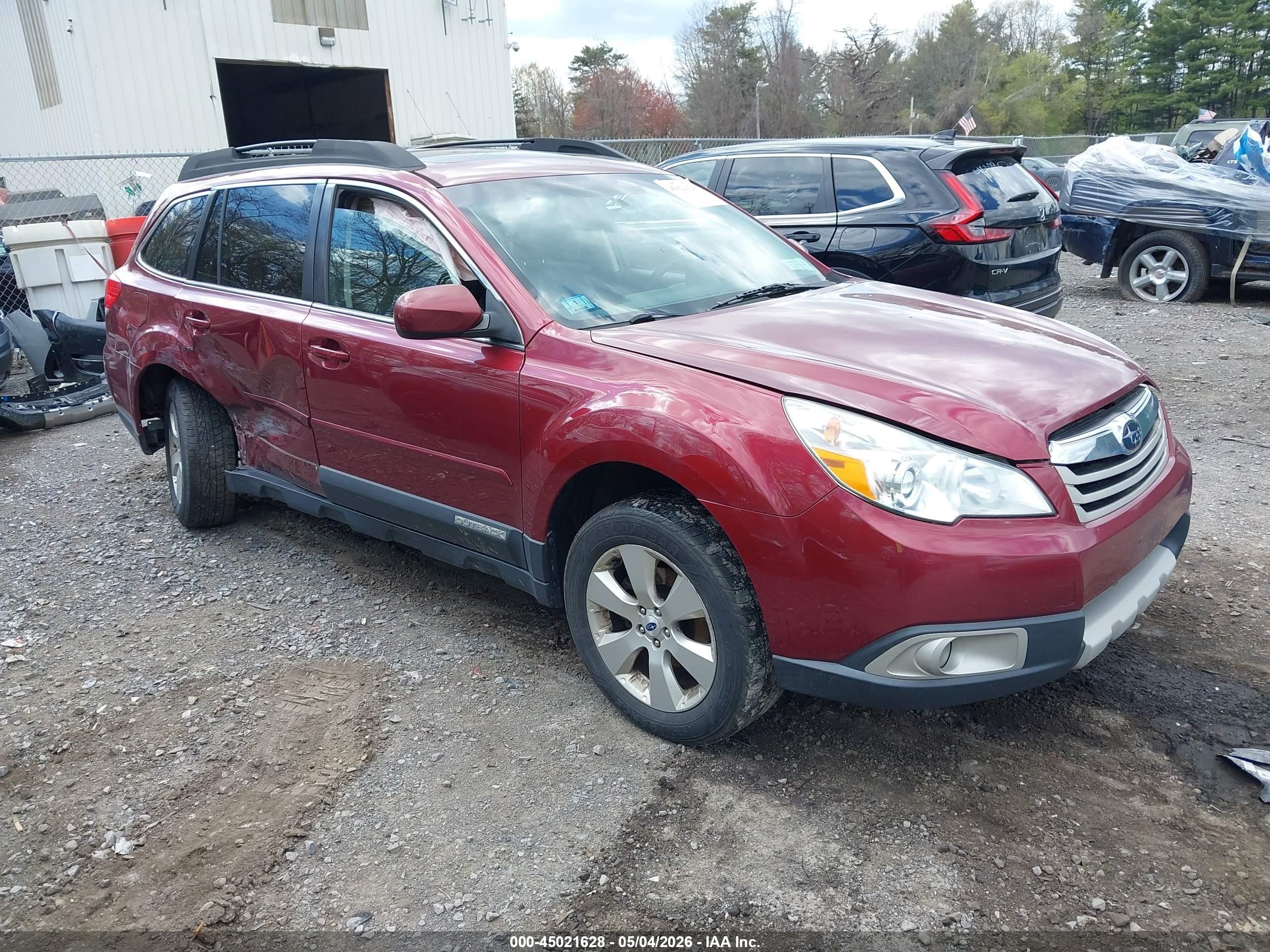 2012 Subaru Outback Limited, VIN 4S4BRBKC4C3258909 — Side