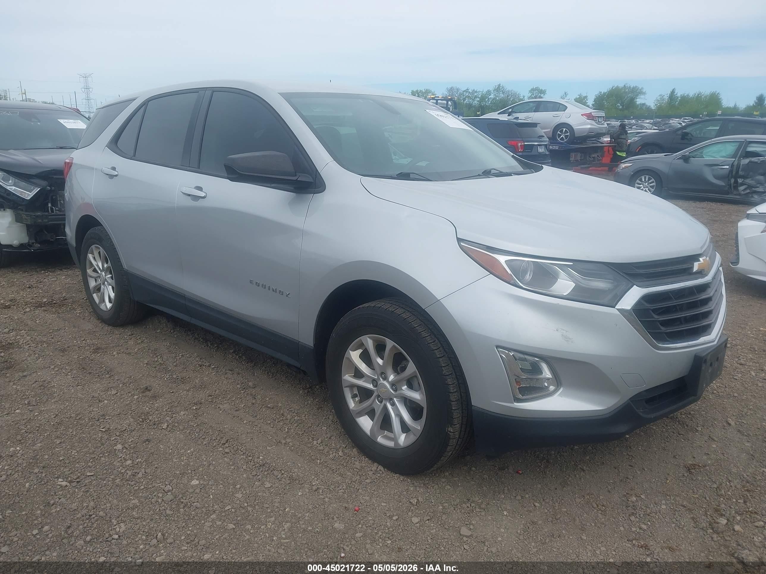 2018 Chevrolet Equinox LS, VIN 2GNAXREV3J6309759 — Hail
