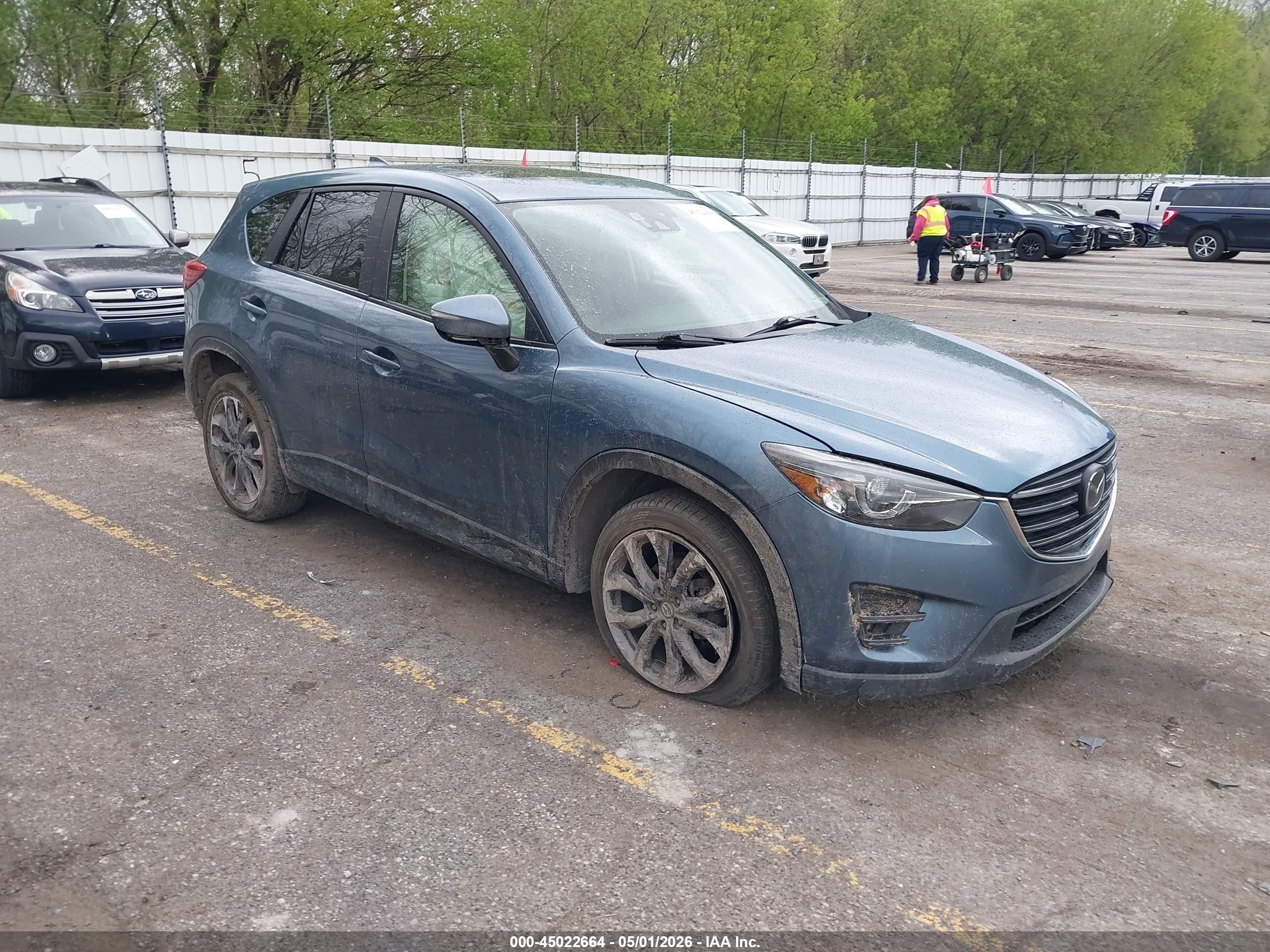 2016 Mazda CX-5 Grand Touring, VIN JM3KE4DY9G0698868 — Front end
