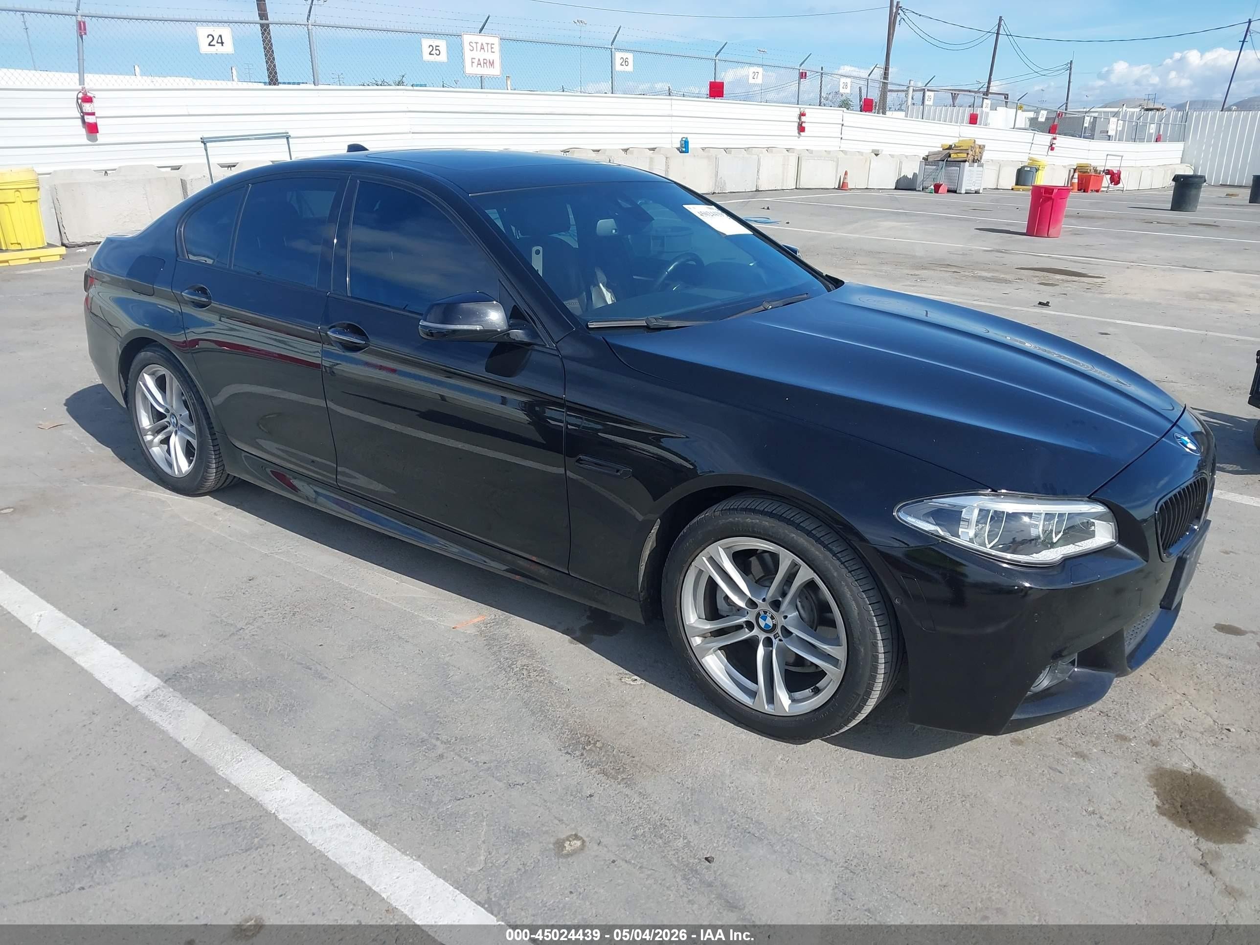 2016 BMW 5 Series 528i, VIN WBA5A5C52GG353958 — Side
