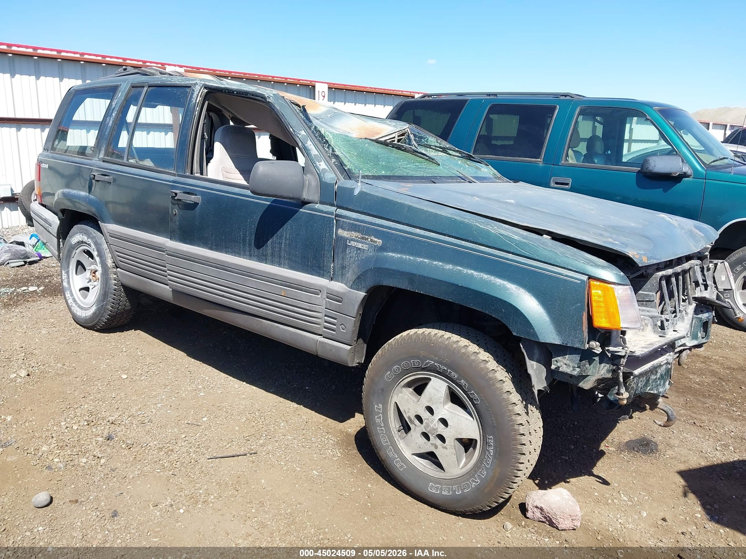 1993 Jeep Grand Cherokee Laredo, VIN 1J4GZ58SXPC119846 — Rollover