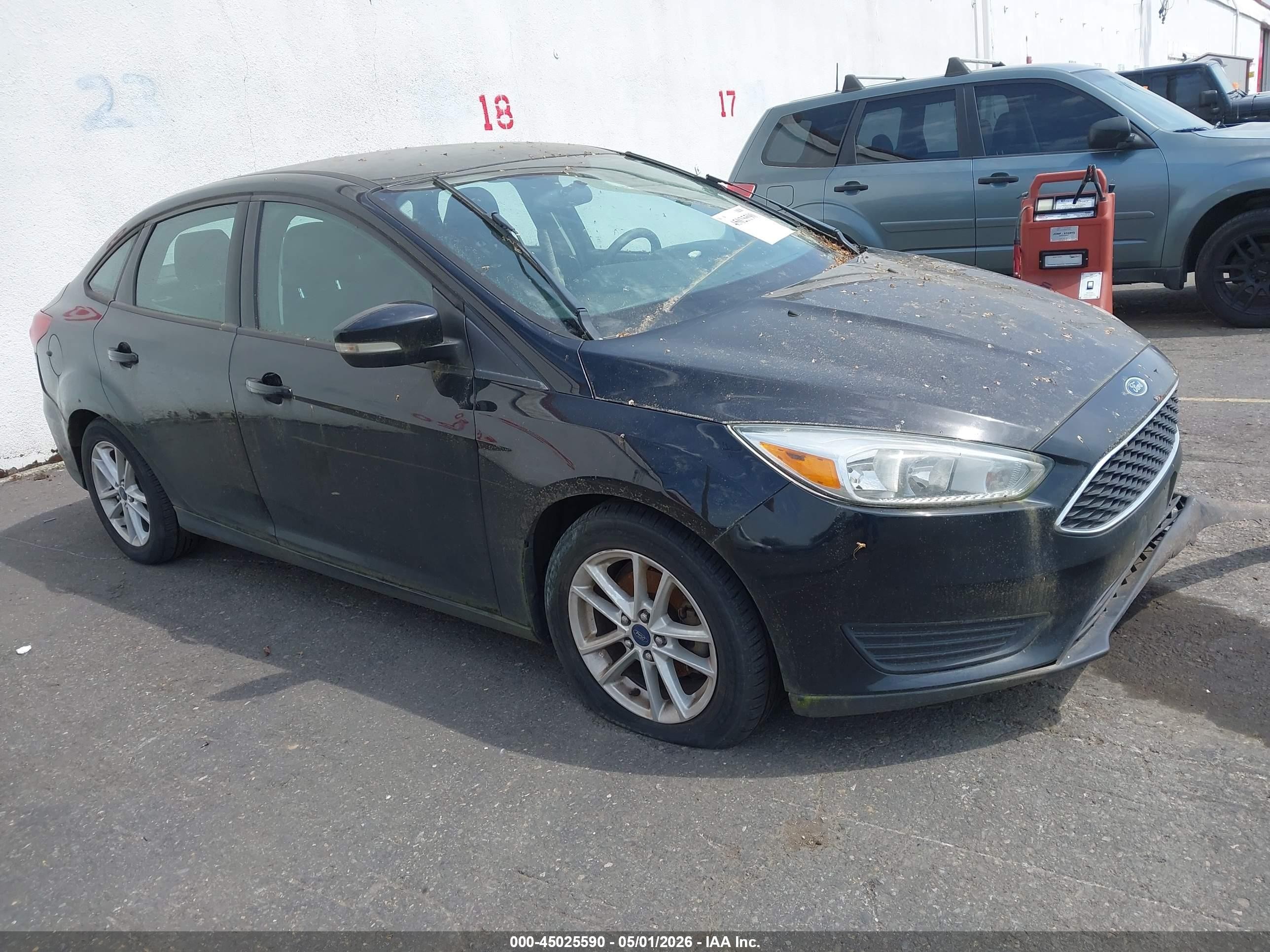 2016 Ford Focus SE, VIN 1FADP3F2XGL271248 — Normal wear
