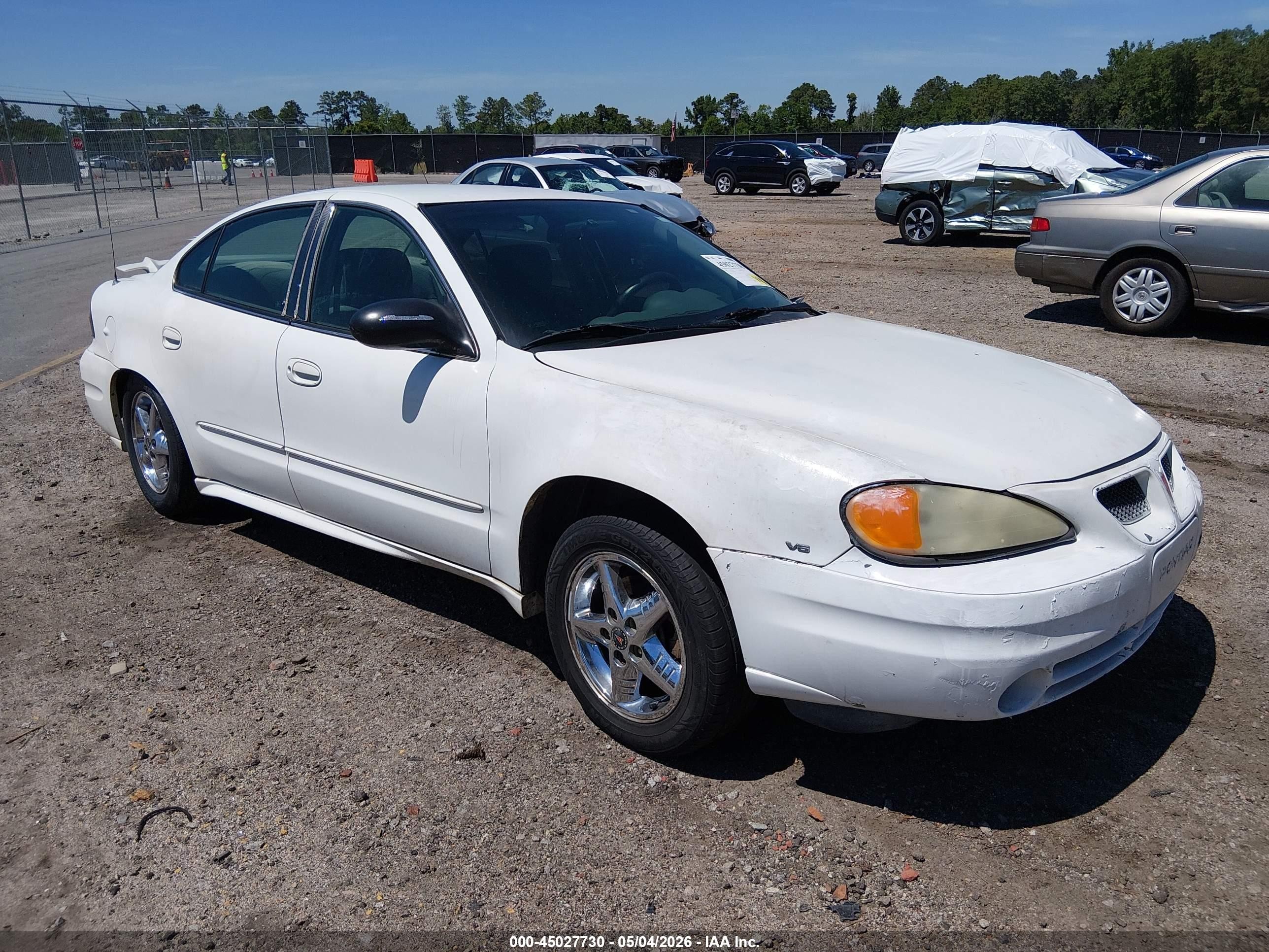 2004 Pontiac Grand Am SE1, VIN 1G2NF52E64M593439 — Side